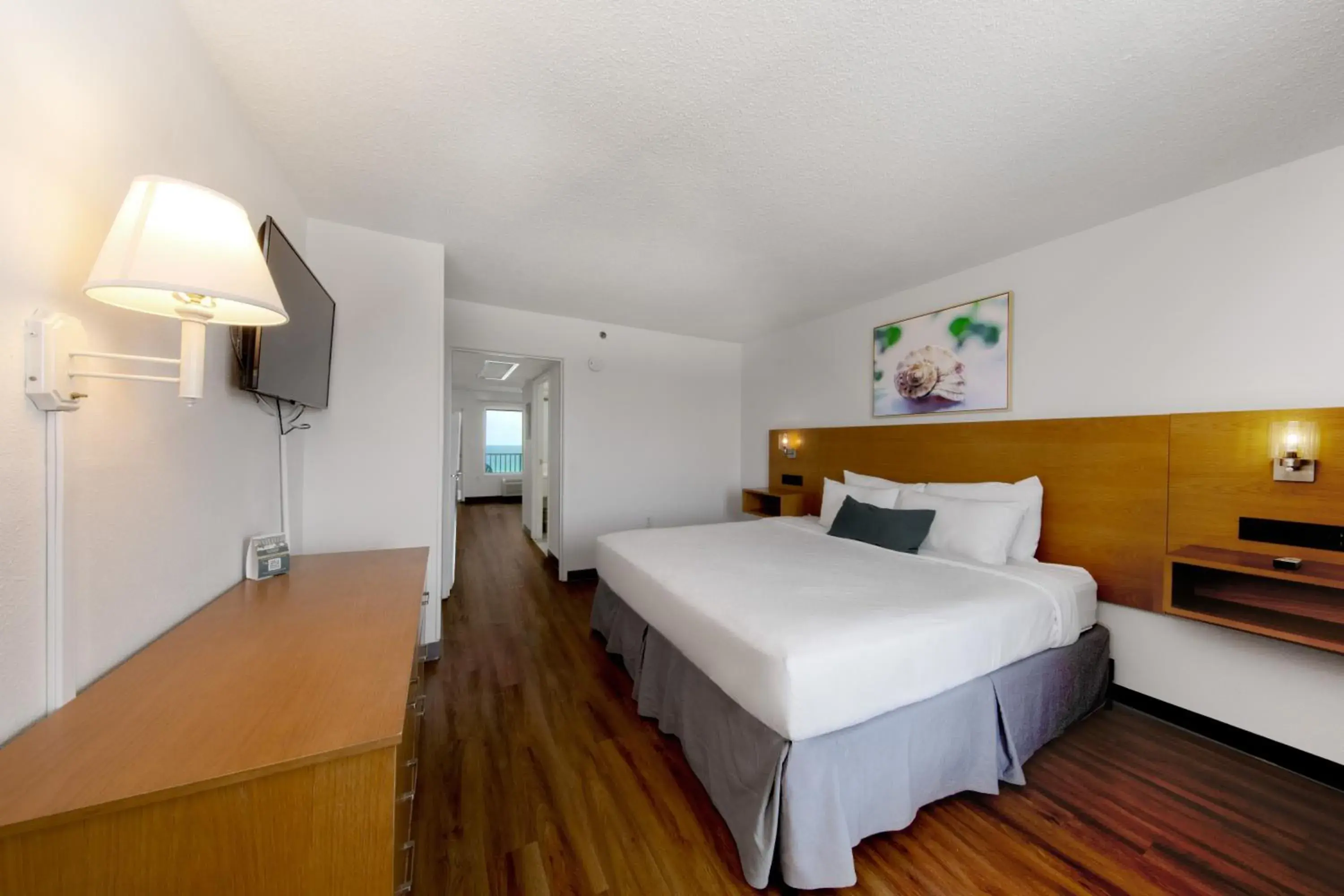 Bed in Beachcomber Beachfront Hotel, a By The Sea Resort Bed in Beachcomber Beachfront Hotel, a By The Sea Resort