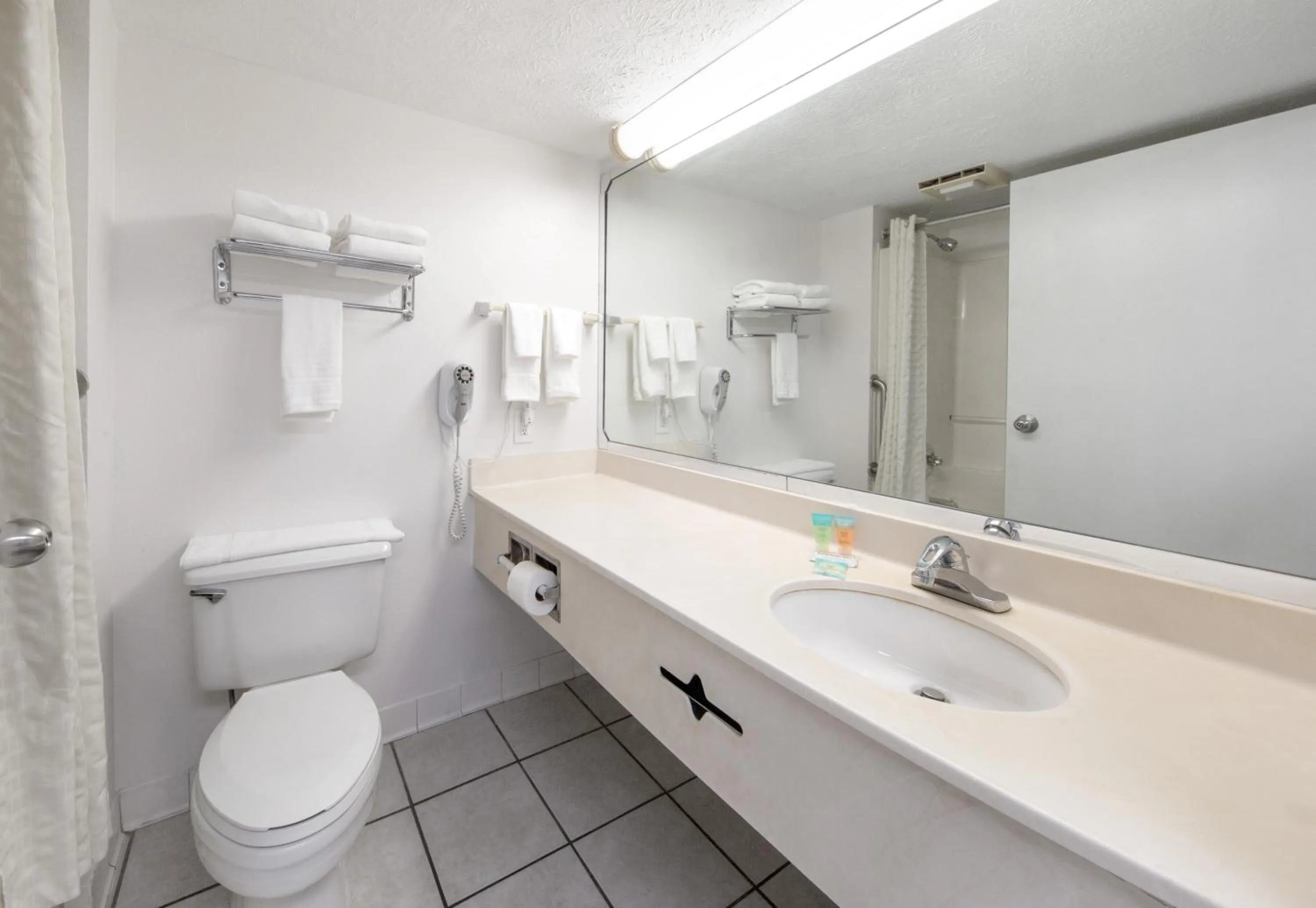 Bathroom in Beachcomber Beachfront Hotel, a By The Sea Resort