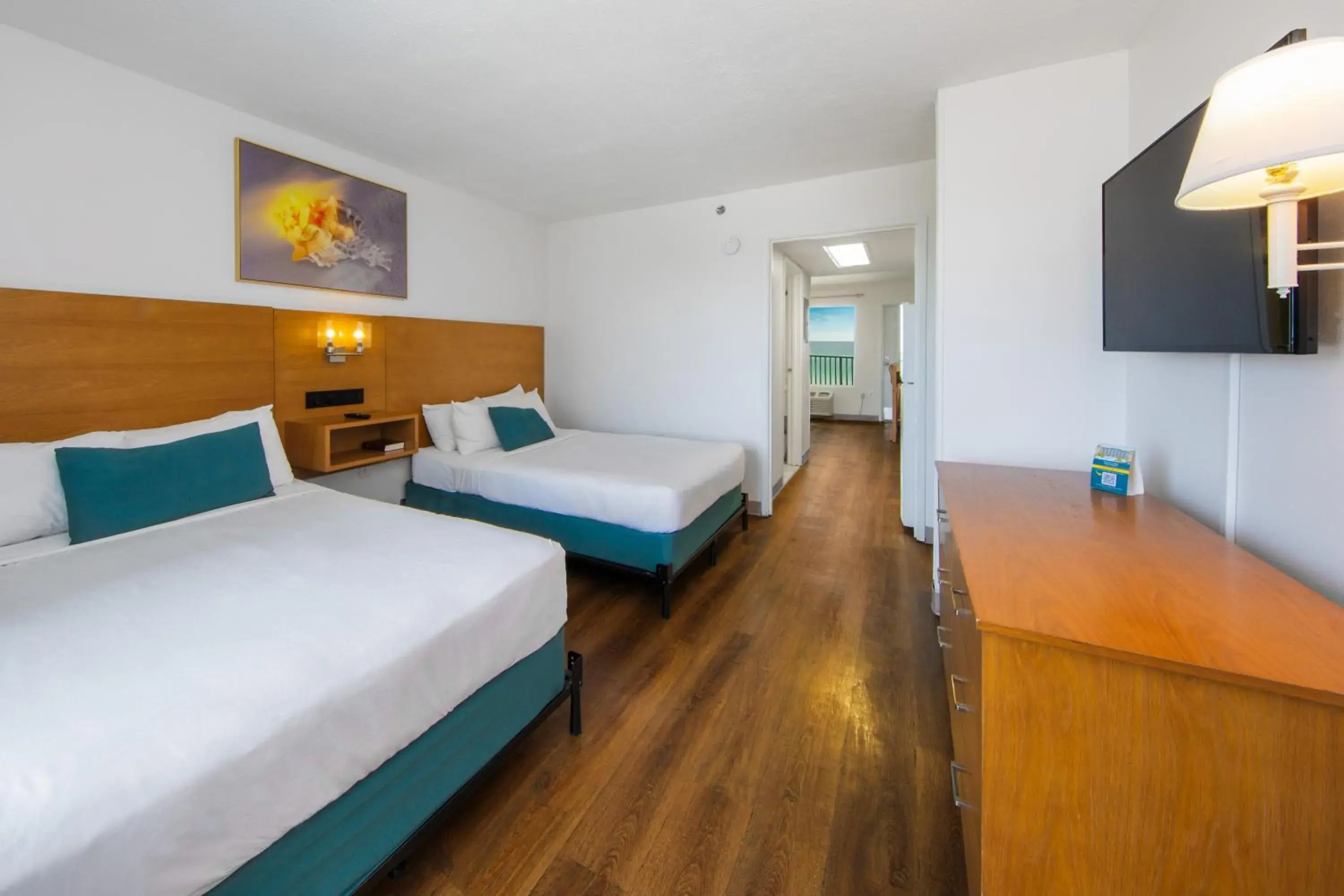 Bed in Beachcomber Beachfront Hotel, a By The Sea Resort Bed in Beachcomber Beachfront Hotel, a By The Sea Resort