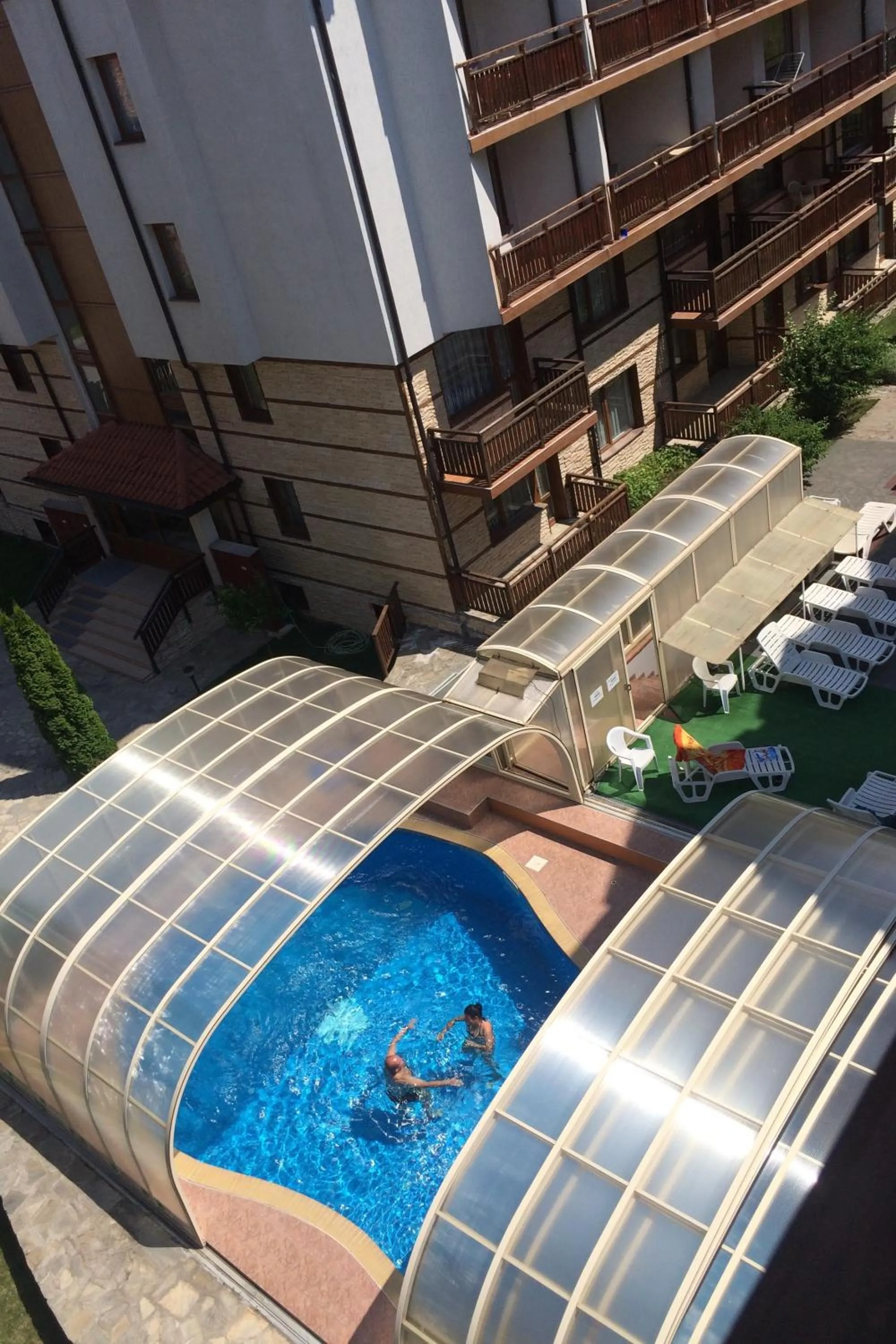 Pool view in Apartments Four Leaf Clover Bansko to rent
