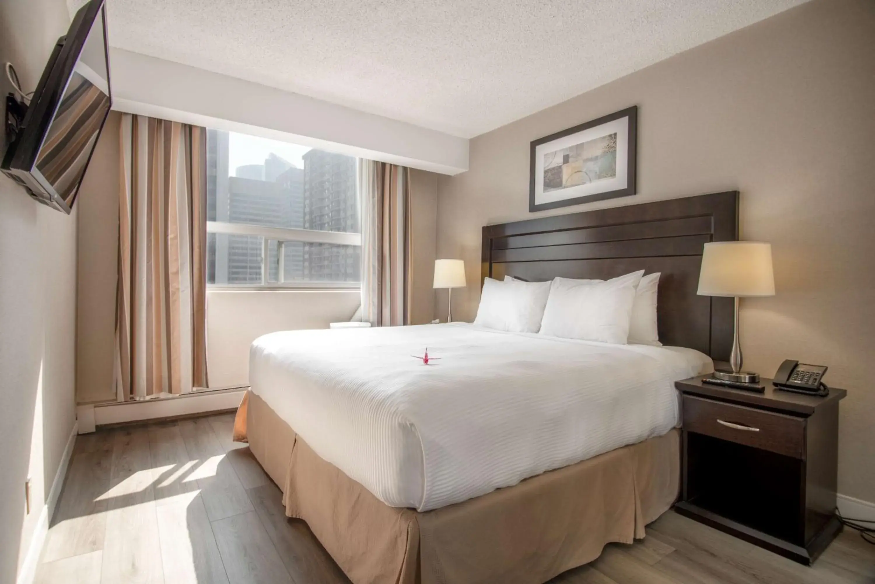 Bed in Coast Calgary Downtown Hotel & Suites by APA Bed in Coast Calgary Downtown Hotel & Suites by APA