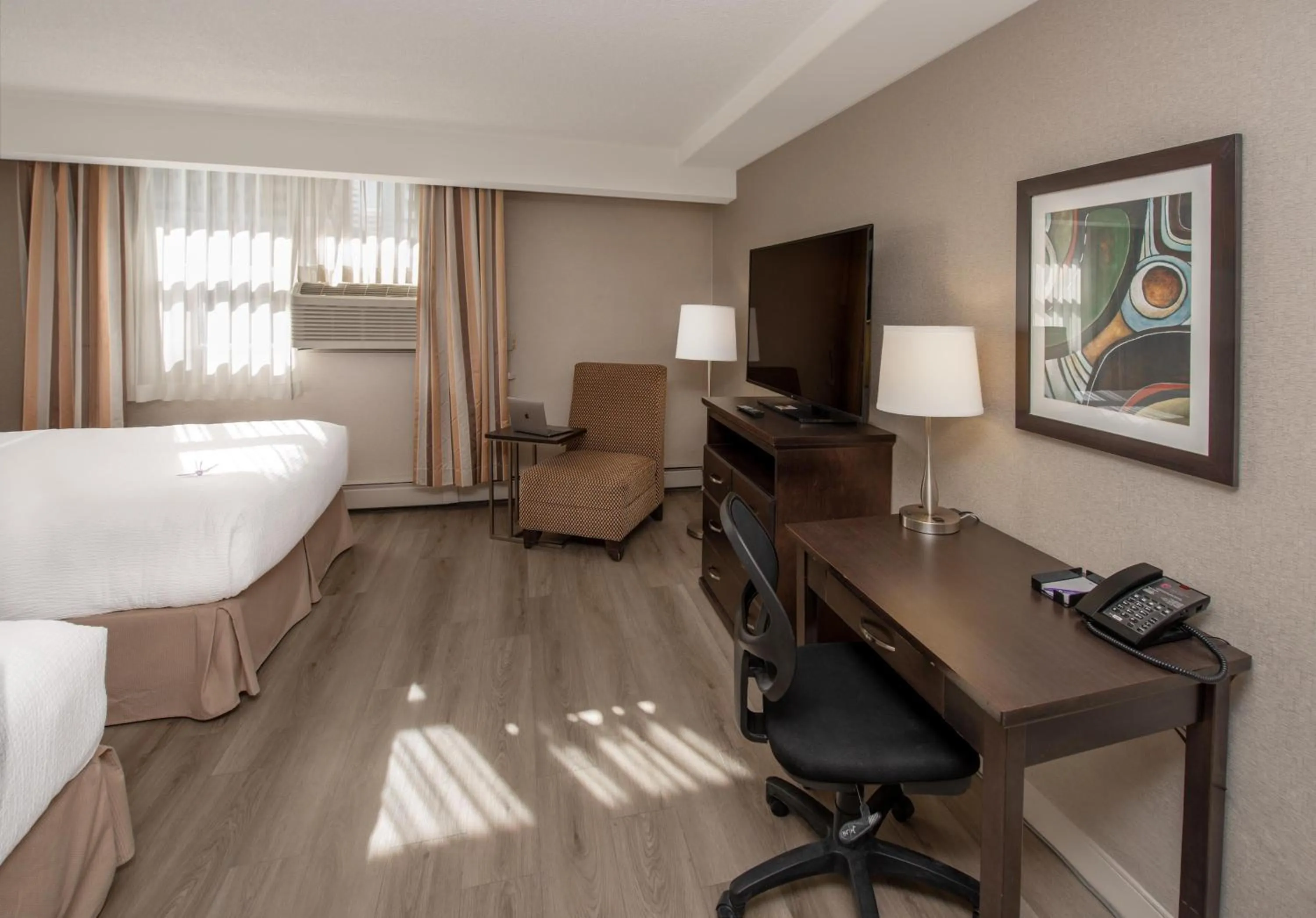 Bedroom, Bed in Coast Calgary Downtown Hotel & Suites by APA