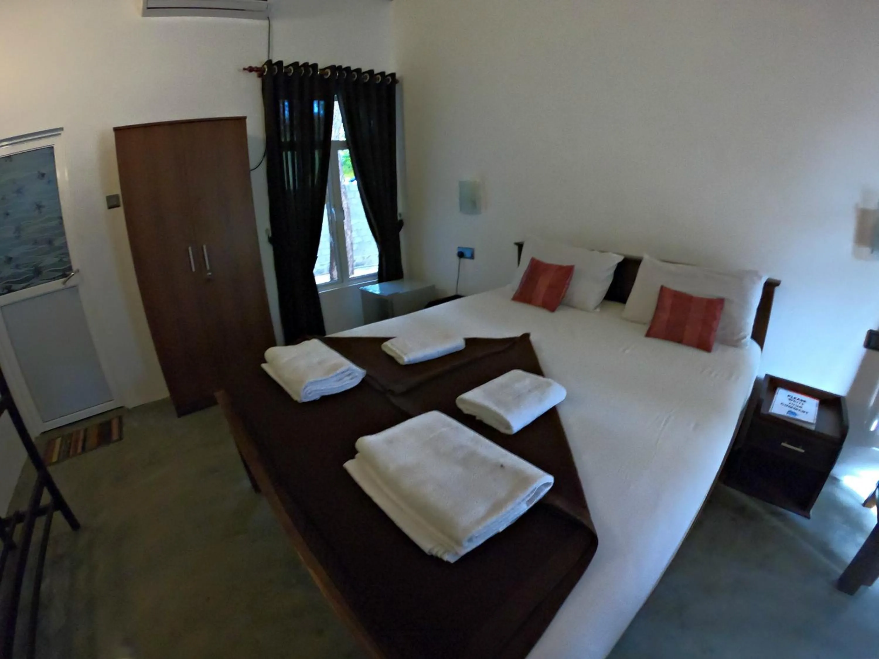 Bed in Luna Beach Hotel