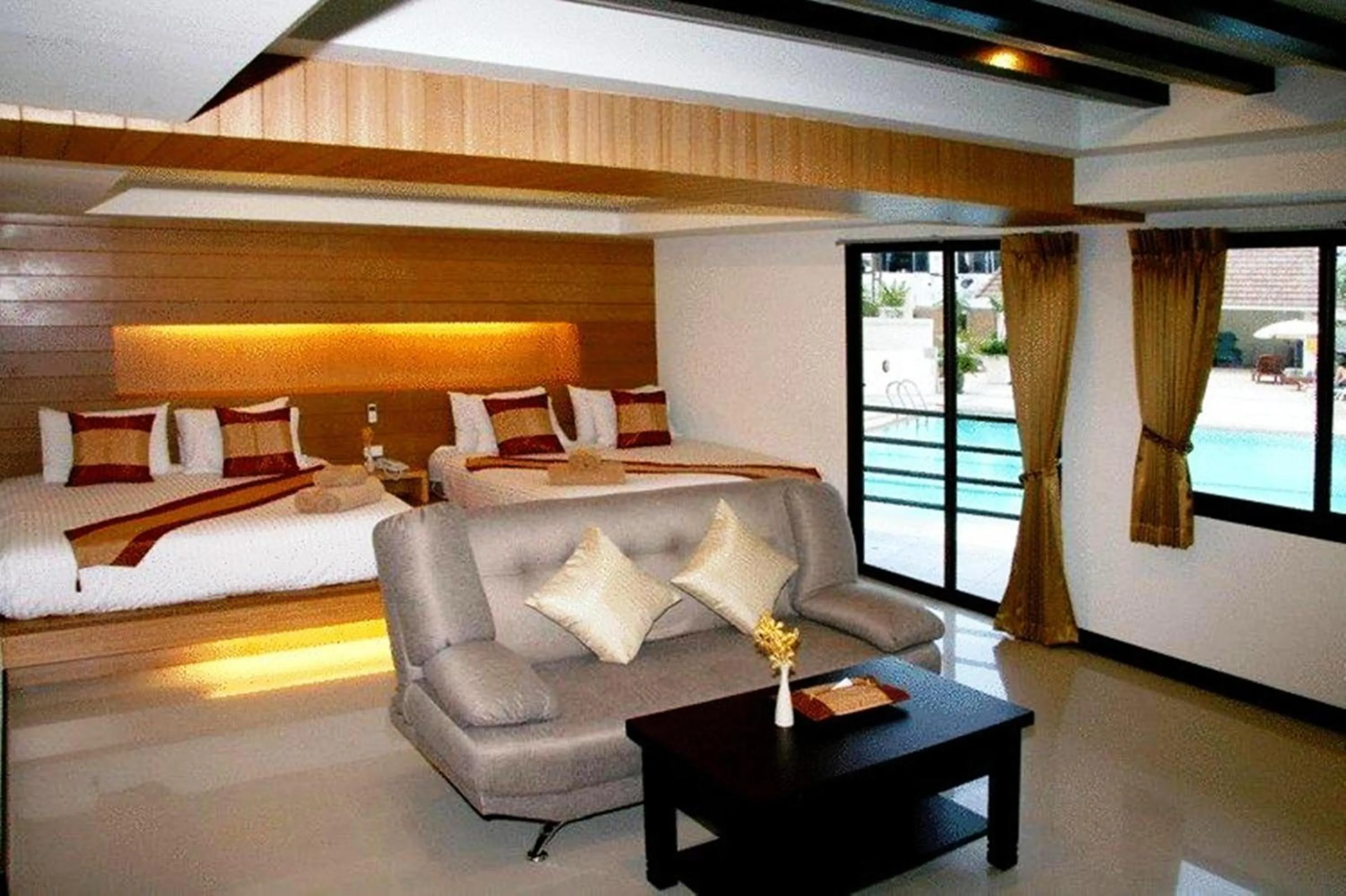 Photo of the whole room, Bed in Tanawit Hotel & Spa