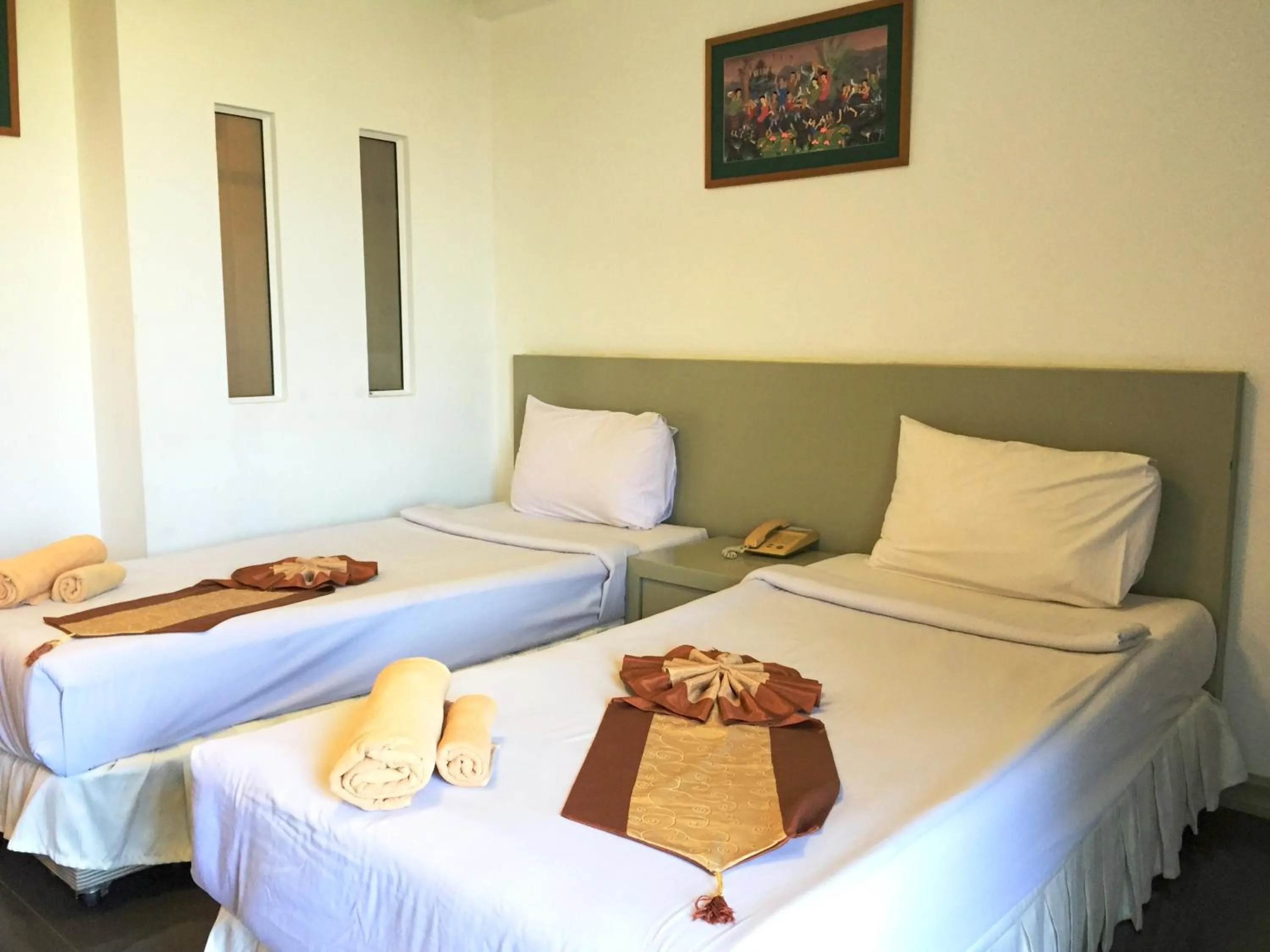 Bed in Tanawit Hotel & Spa