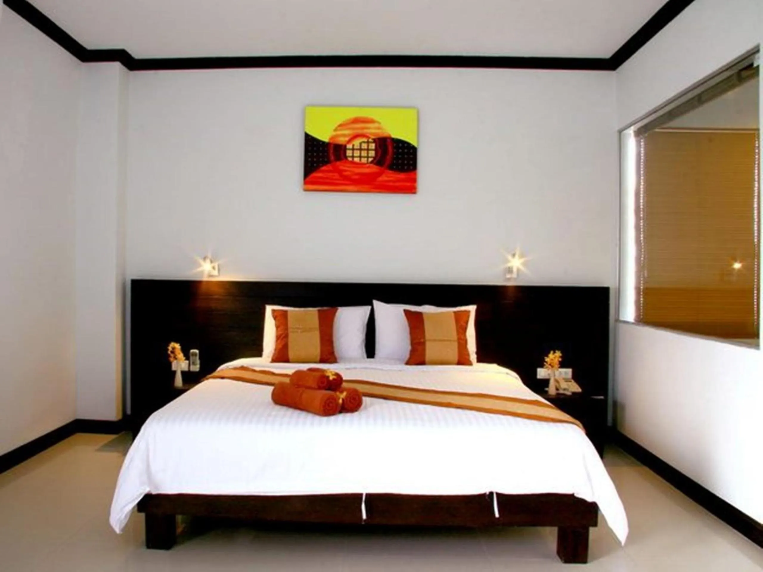 Bed in Tanawit Hotel & Spa