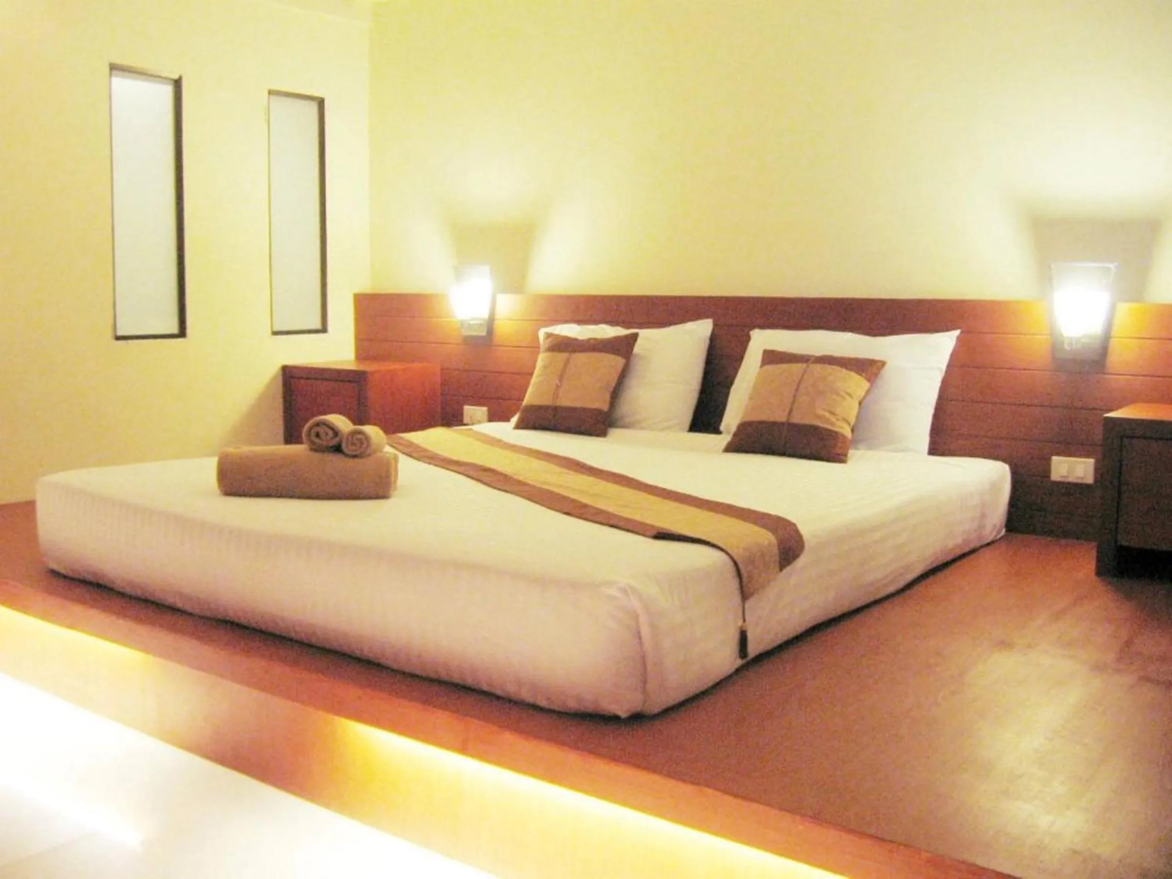 Bed in Tanawit Hotel & Spa