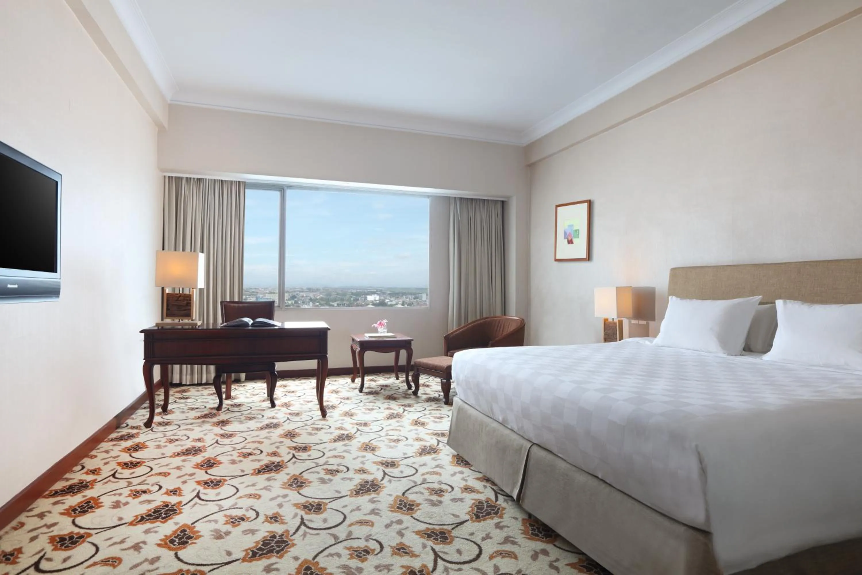 Photo of the whole room, Bed in Grand Mercure Medan Angkasa