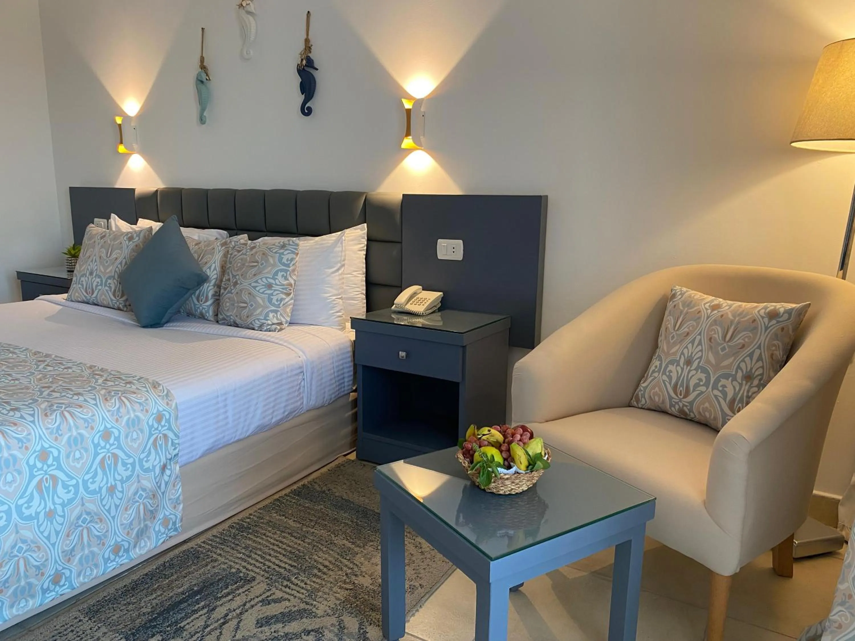 Living room, Bed in Sharm Reef Hotel