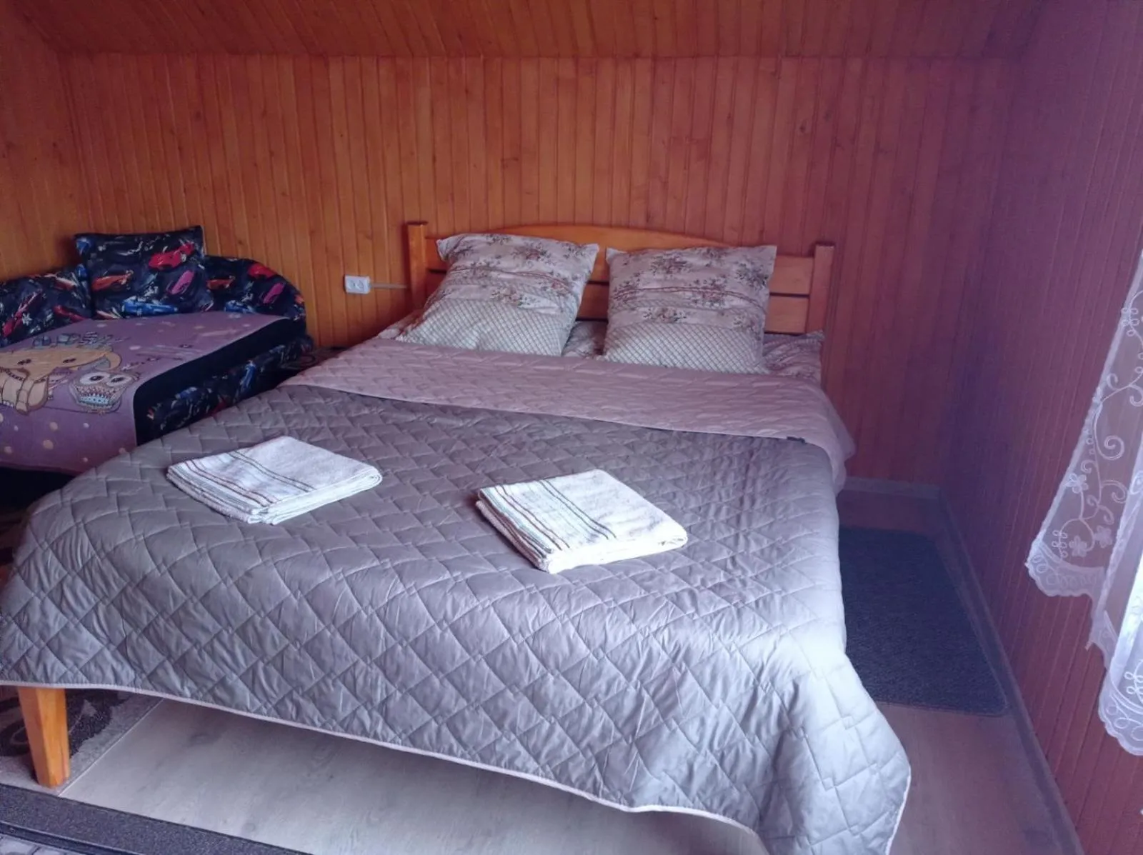 Bed in Romashka Guest House