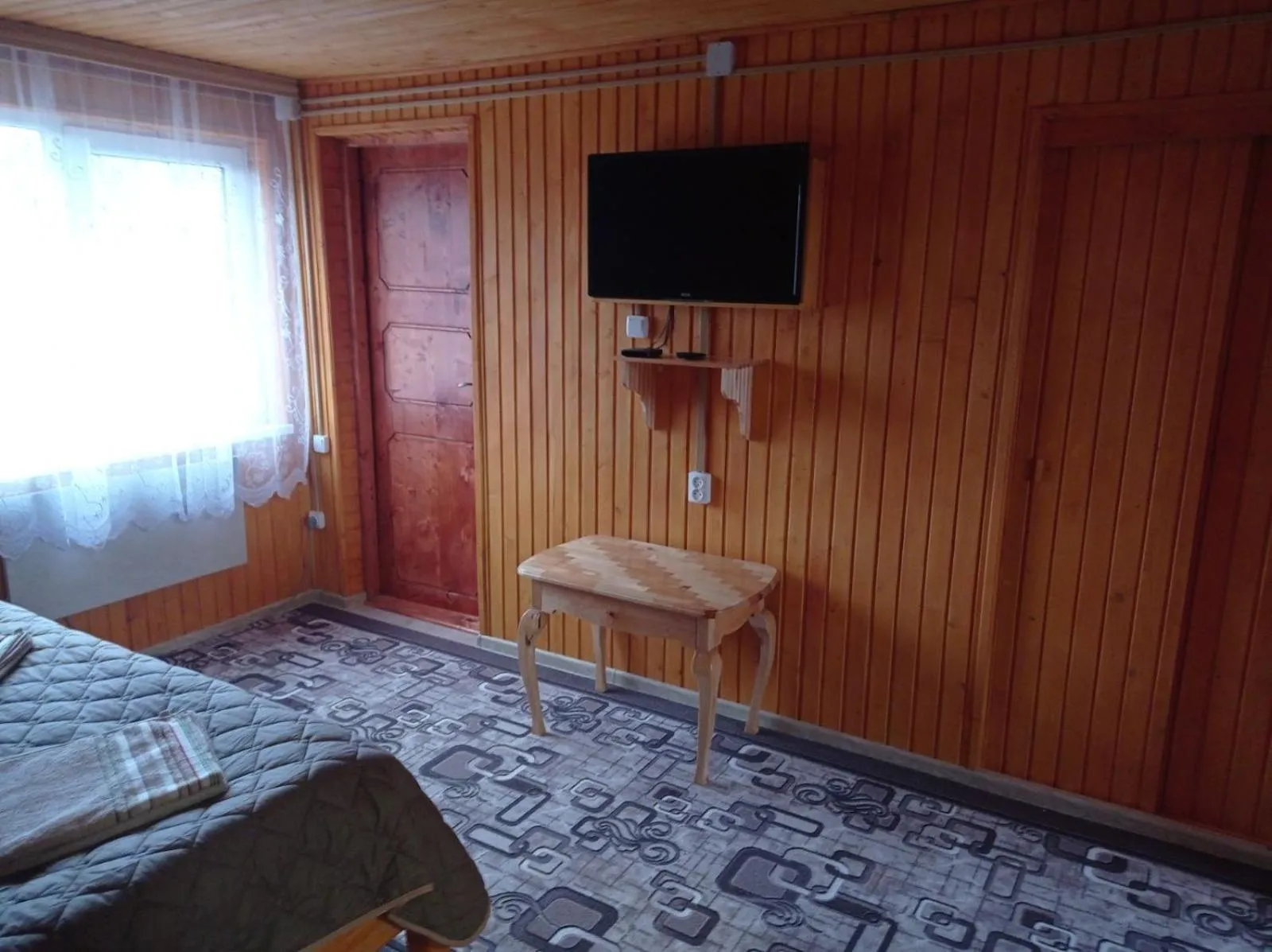 Bed in Romashka Guest House