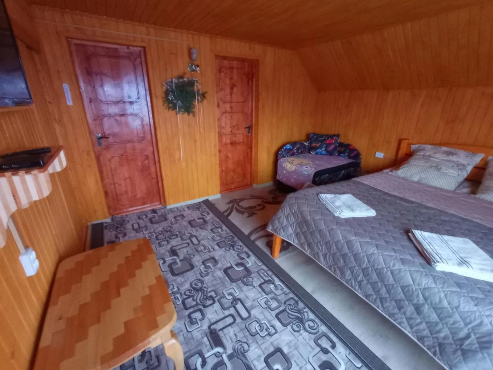 Bed in Romashka Guest House