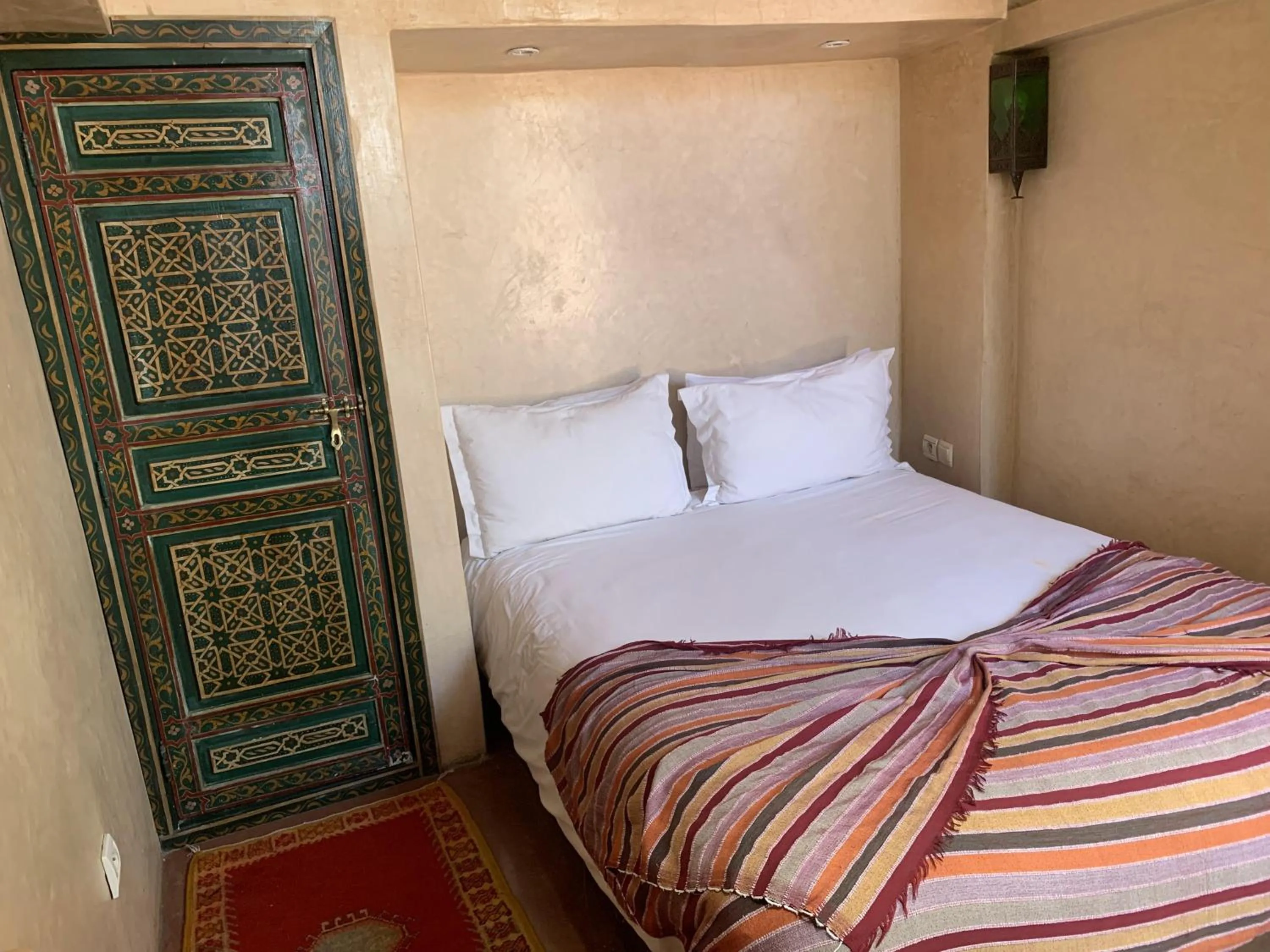 Bed in Riad Moullaoud