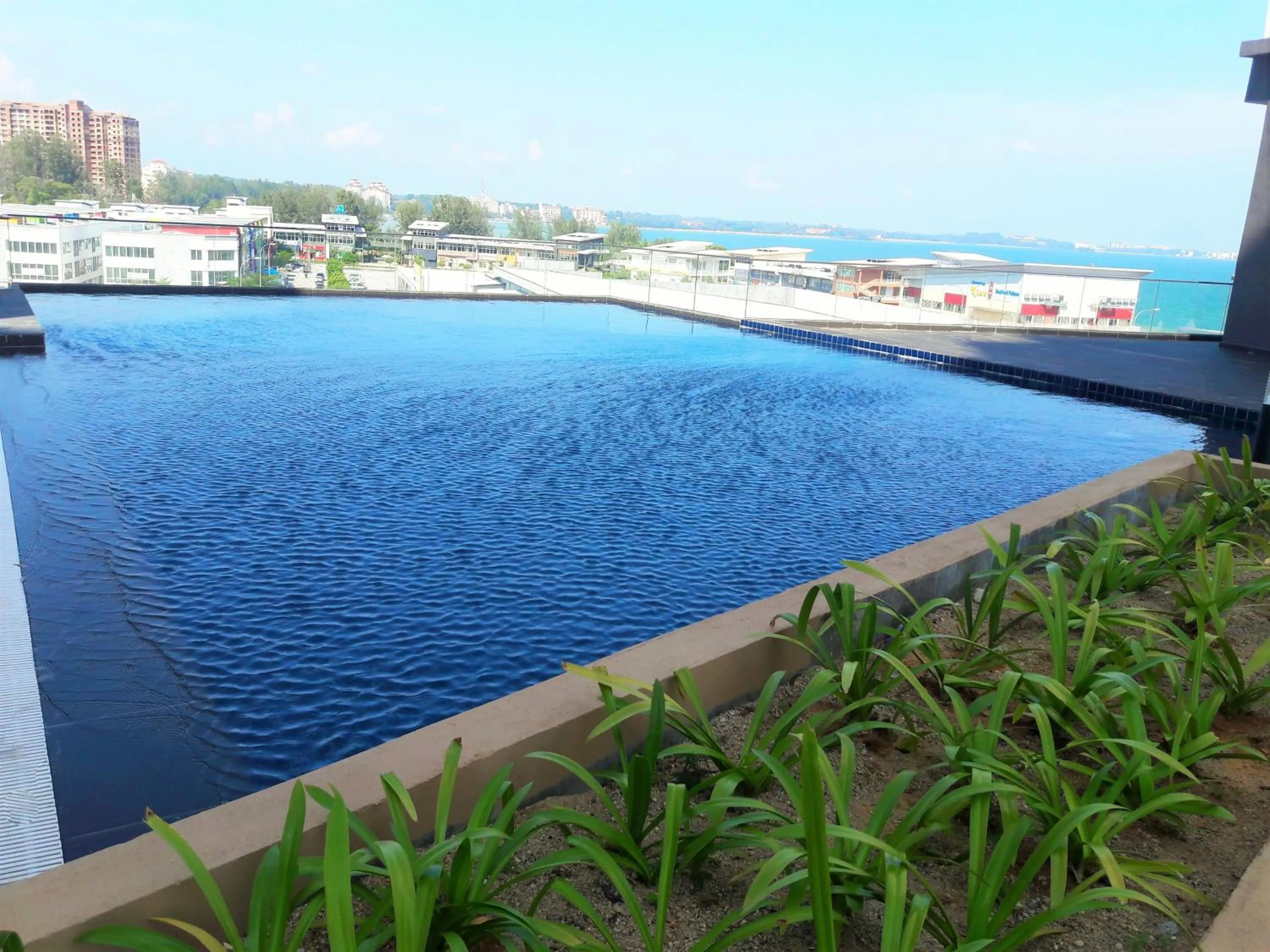 Swimming pool in D'Wharf Hotel & Serviced Residence