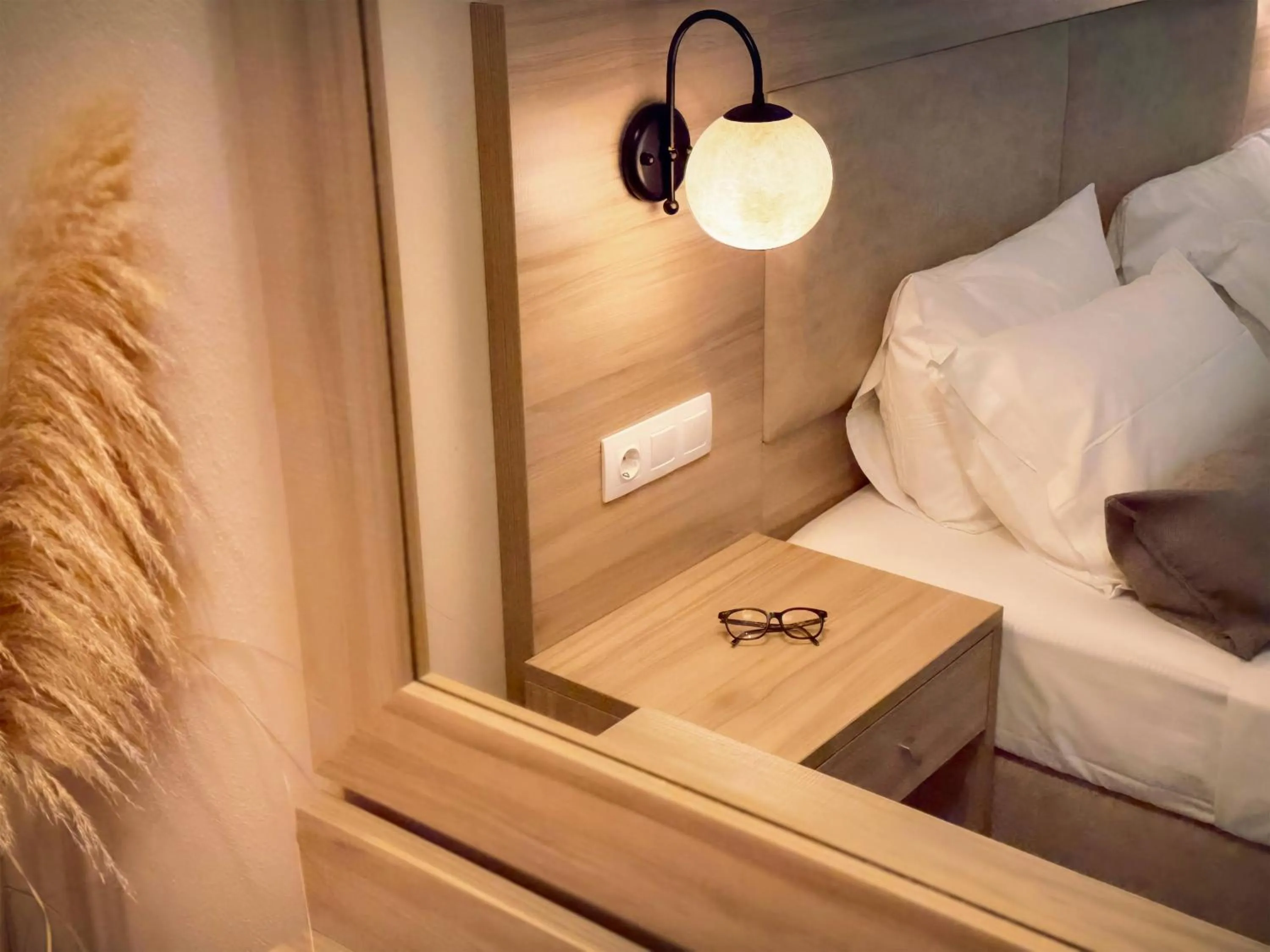 Bed in Mastorakis Hotel and Studios