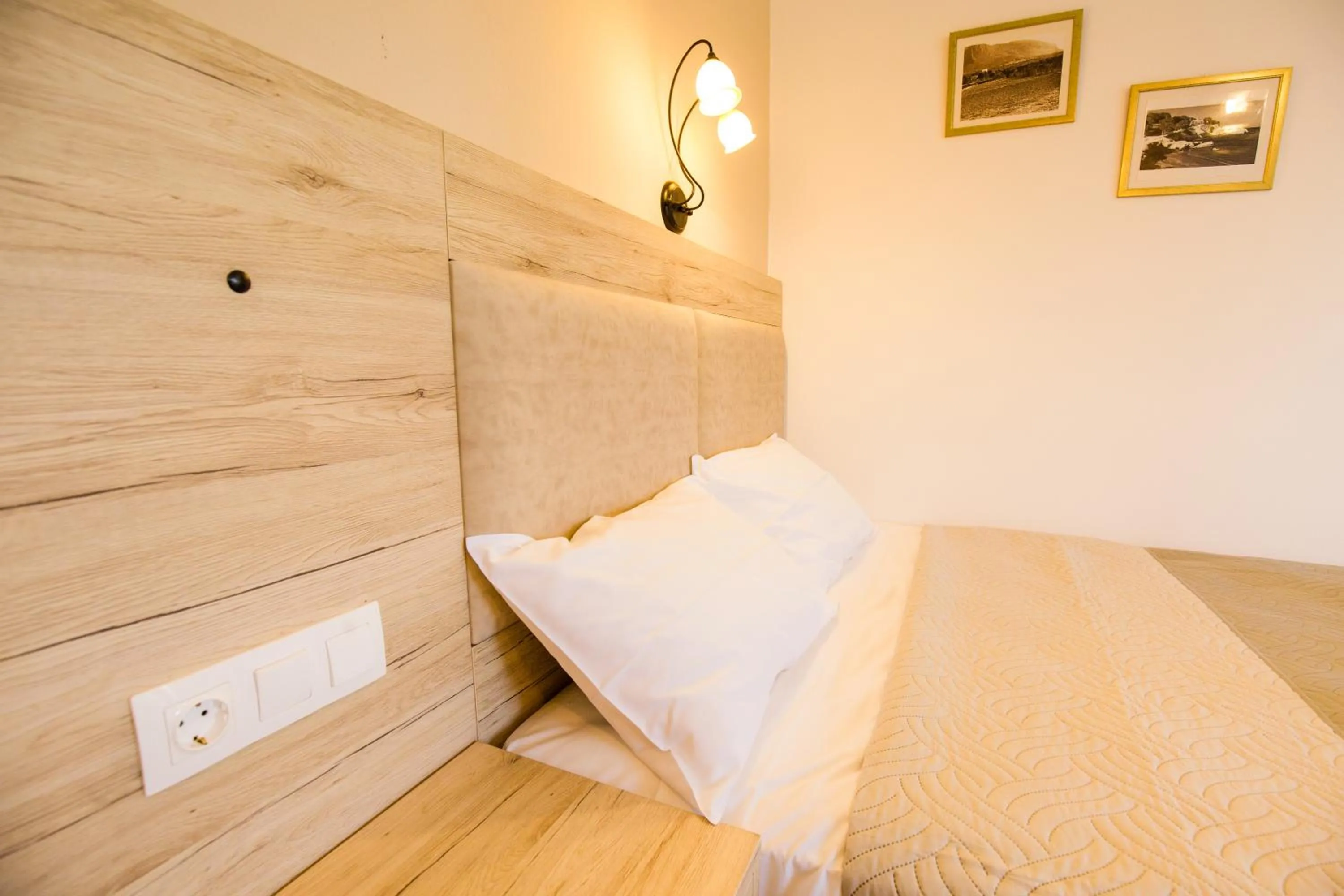 Bed in Mastorakis Hotel and Studios