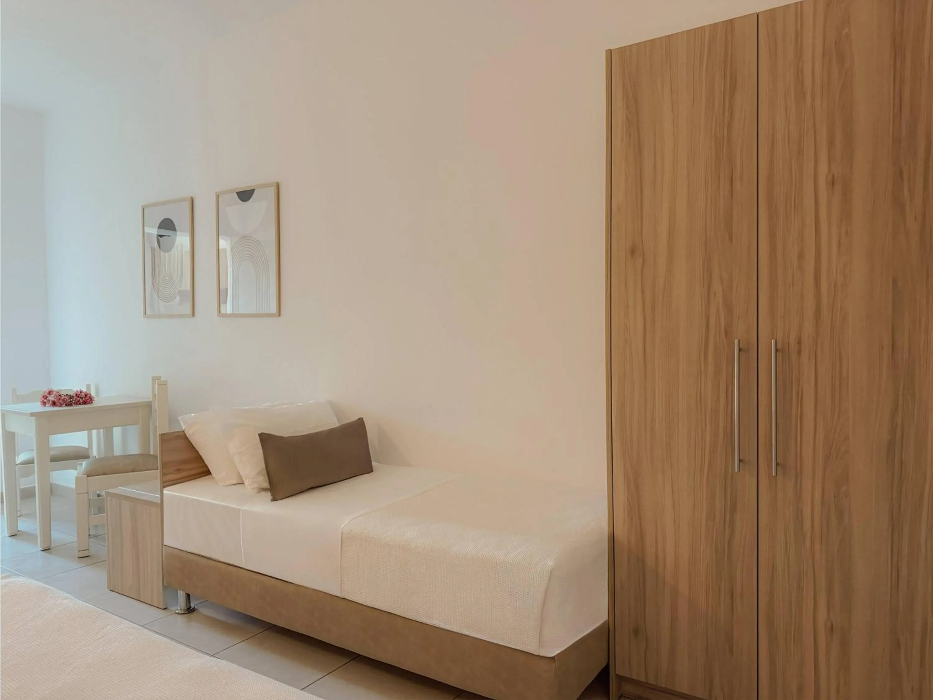 Bed in Mastorakis Hotel and Studios