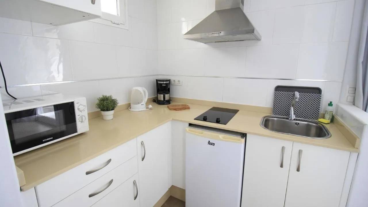 Kitchen or kitchenette in Neptuno Suites - Adults Only