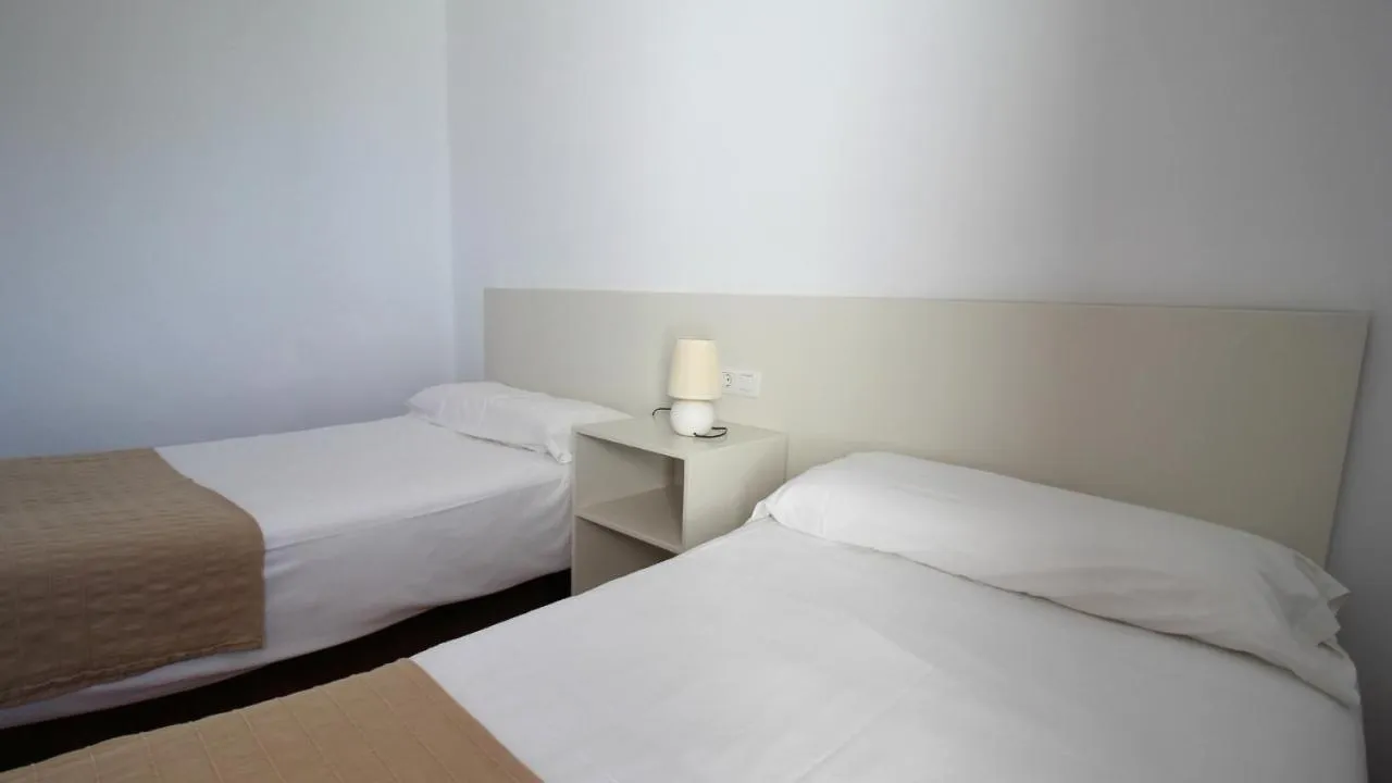 Bed in Neptuno Suites - Adults Only