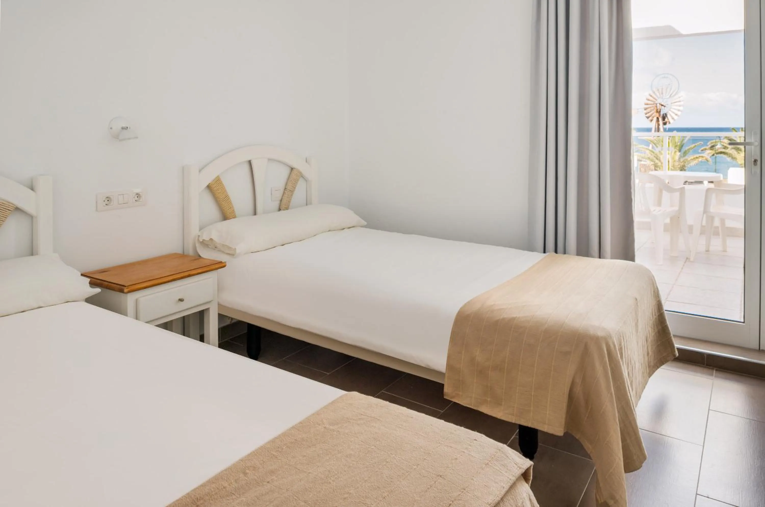 Bed in Neptuno Suites - Adults Only