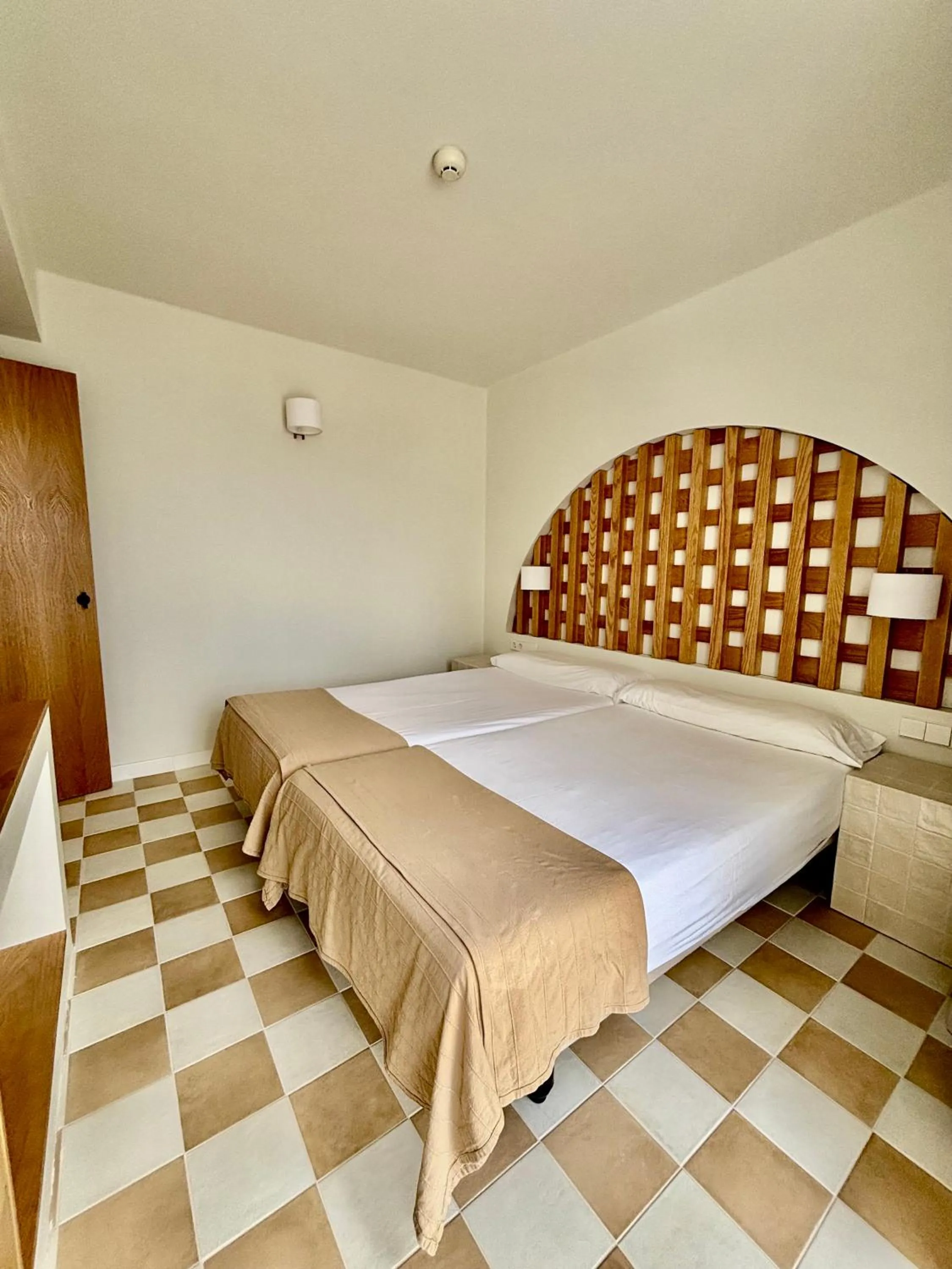 Bed in Neptuno Suites - Adults Only