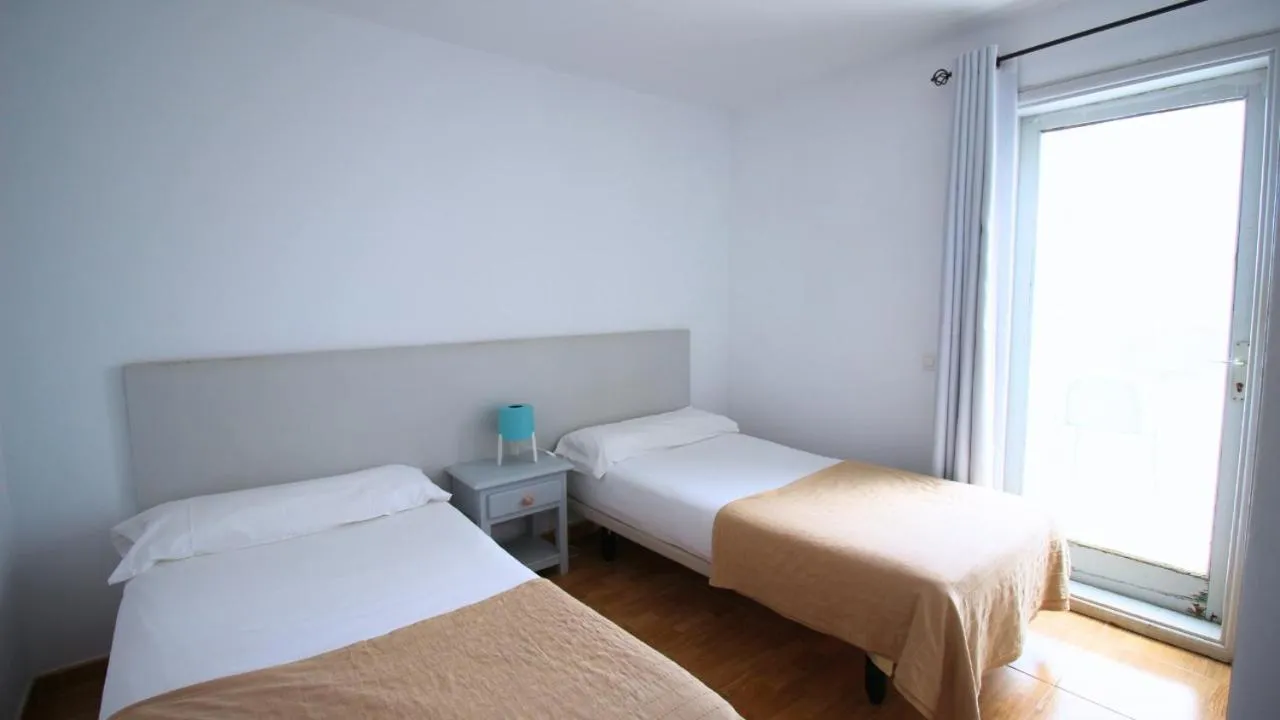 Bed in Neptuno Suites - Adults Only