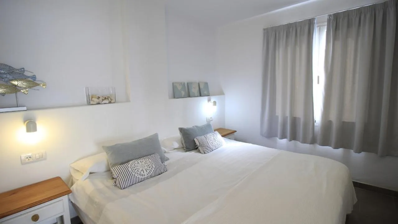 Bed in Neptuno Suites - Adults Only
