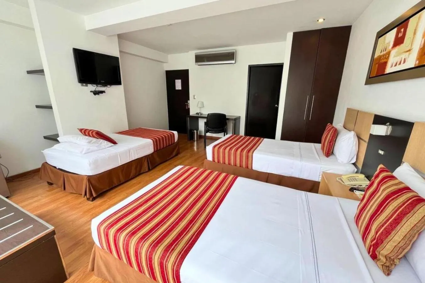 Bed in Allpa Hotel & Suites