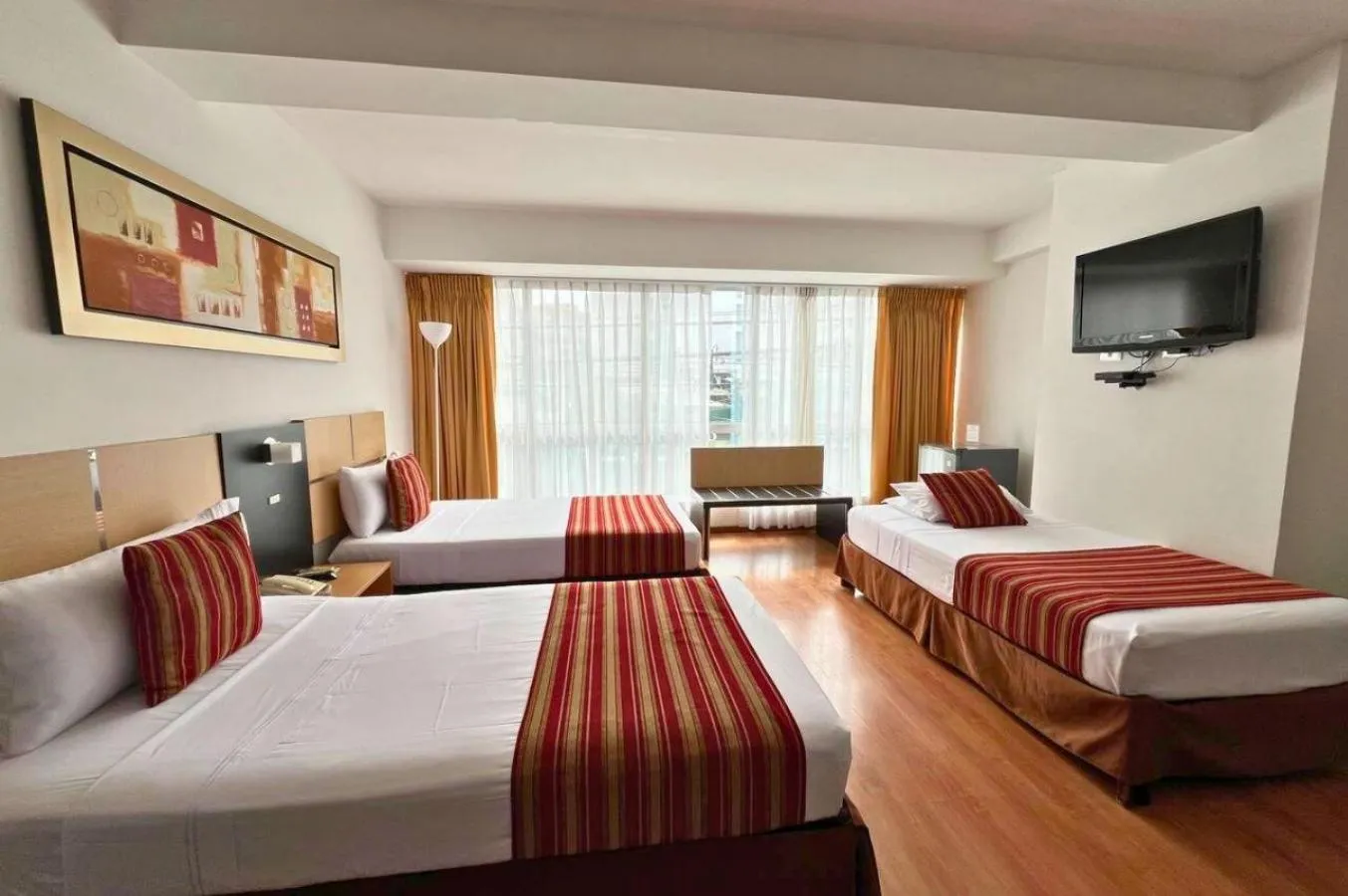 Bed in Allpa Hotel & Suites
