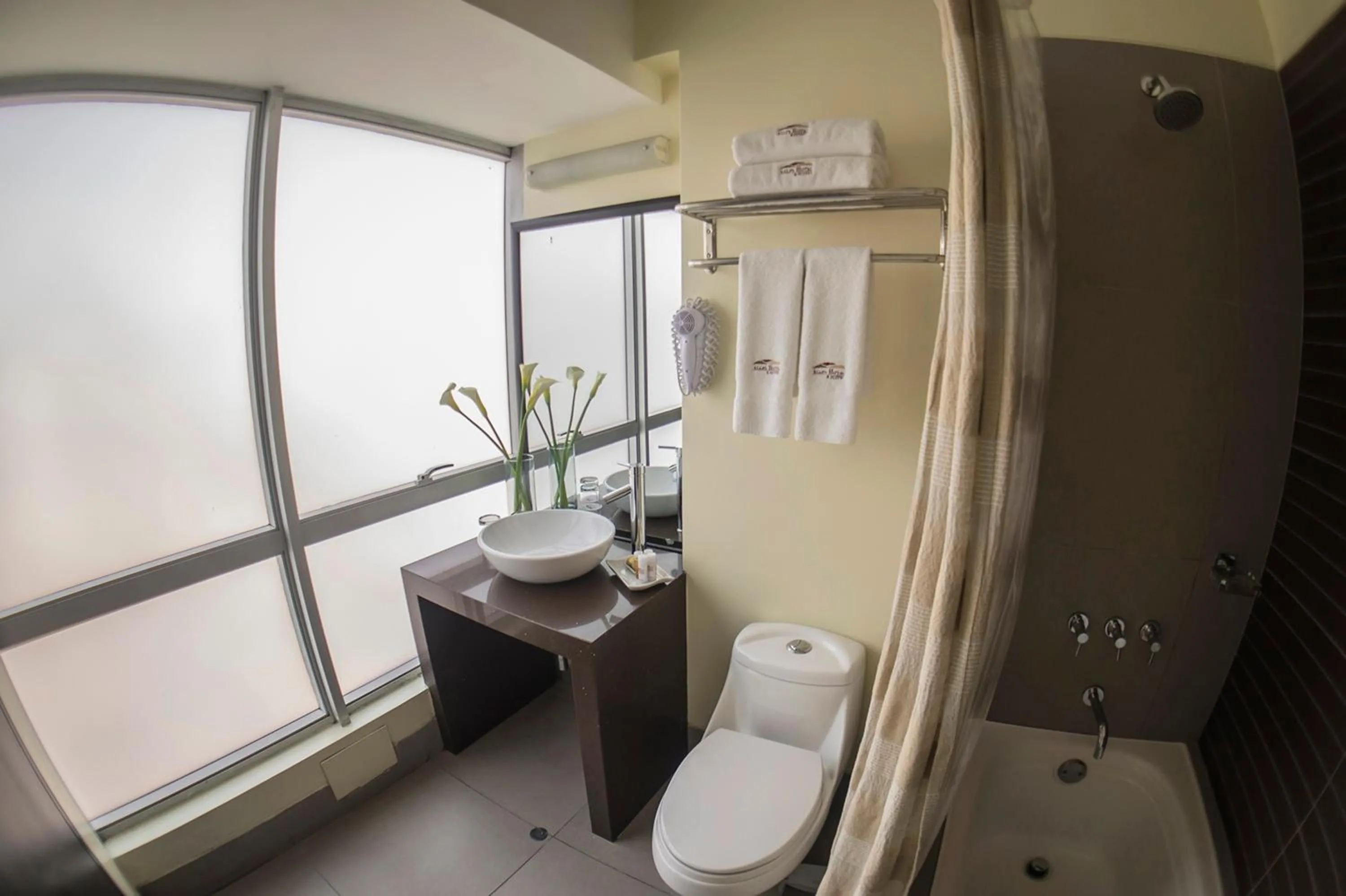 Bathroom in Allpa Hotel & Suites