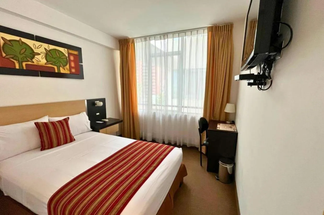 Bed in Allpa Hotel & Suites