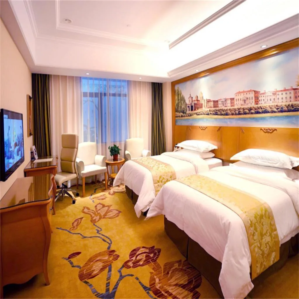 Bed in Vienna Hotel Shanghai Meilan Lake Metro Station