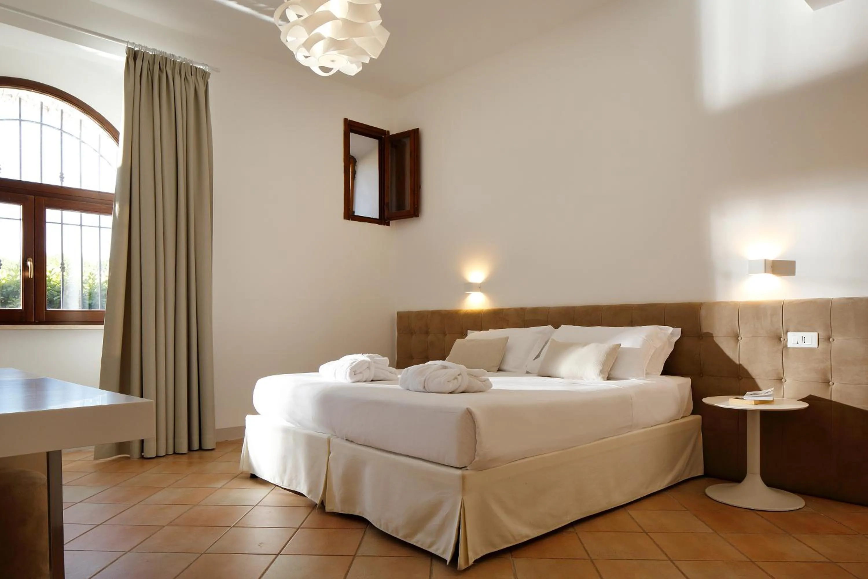 Bed in Giotto Country House & Spa