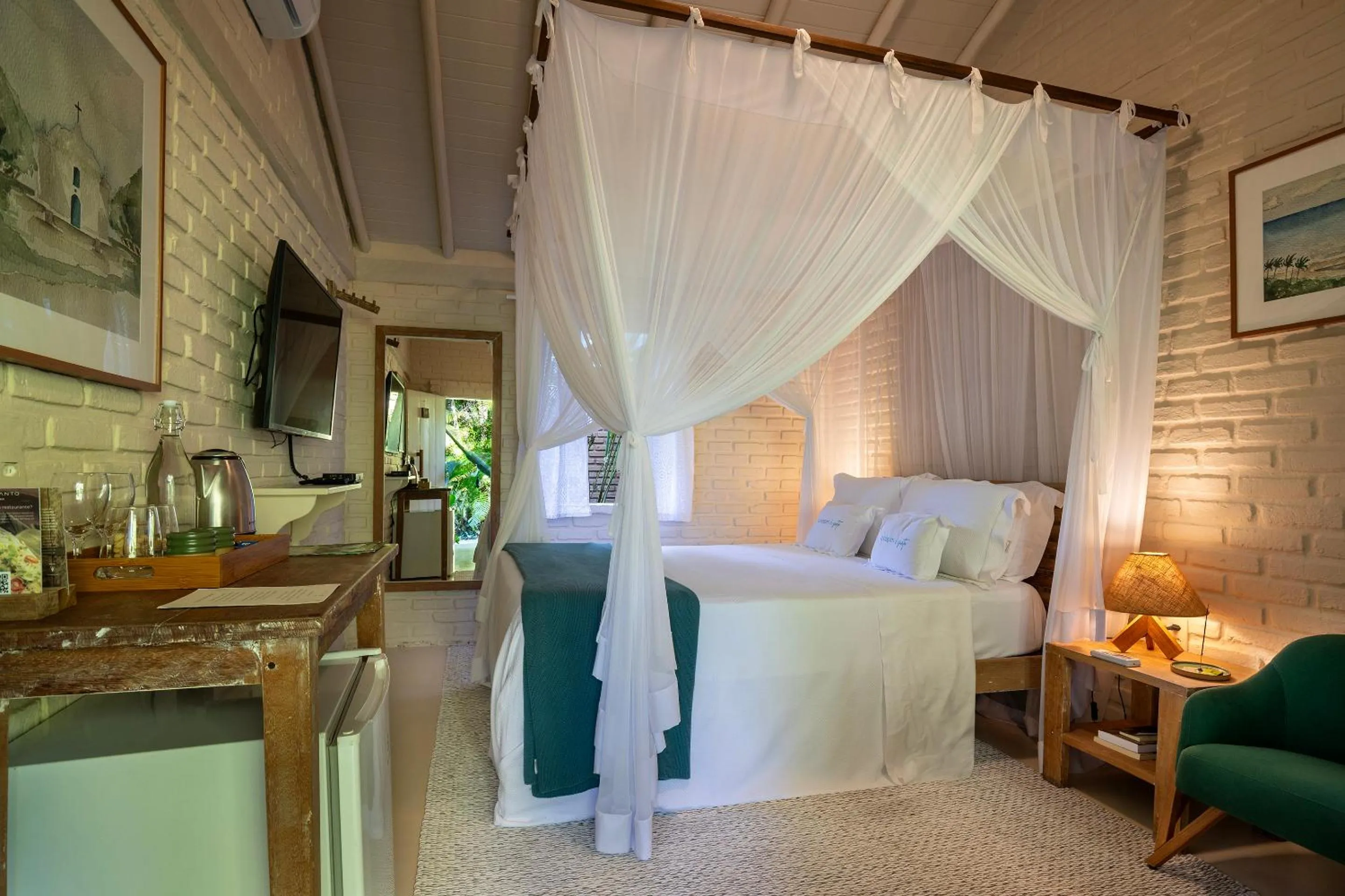 Property building, Bed in Pousada Capim Santo