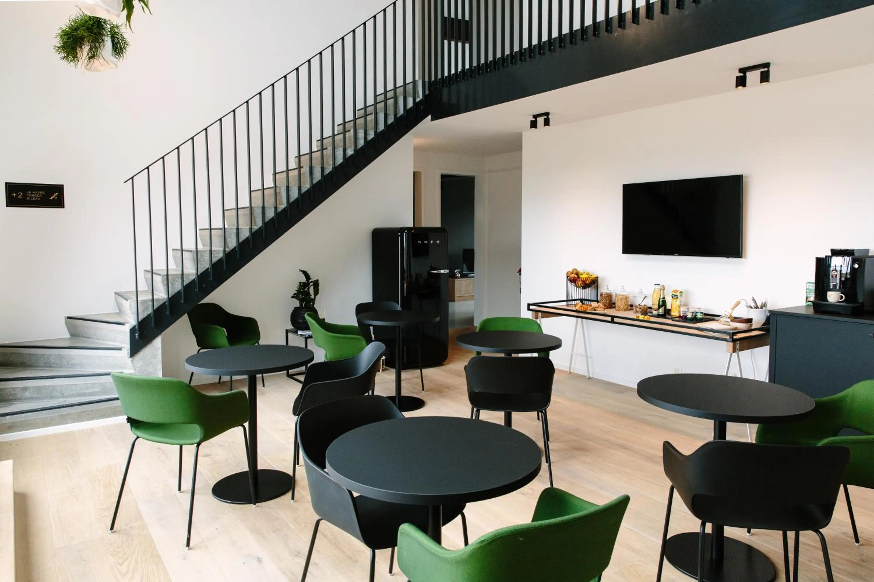 Communal lounge/ TV room in TRUST Hotel