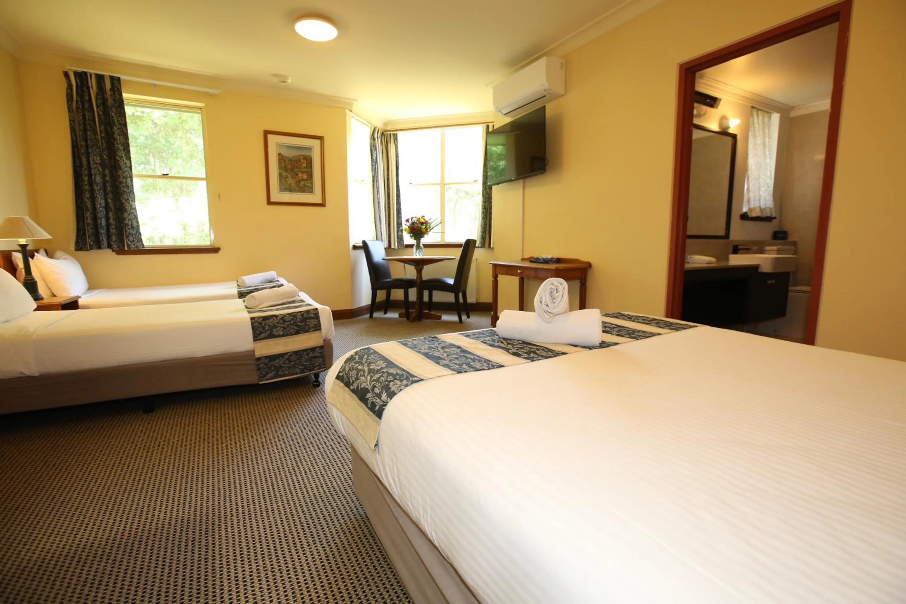 Bed in La Maison Boutique Hotel