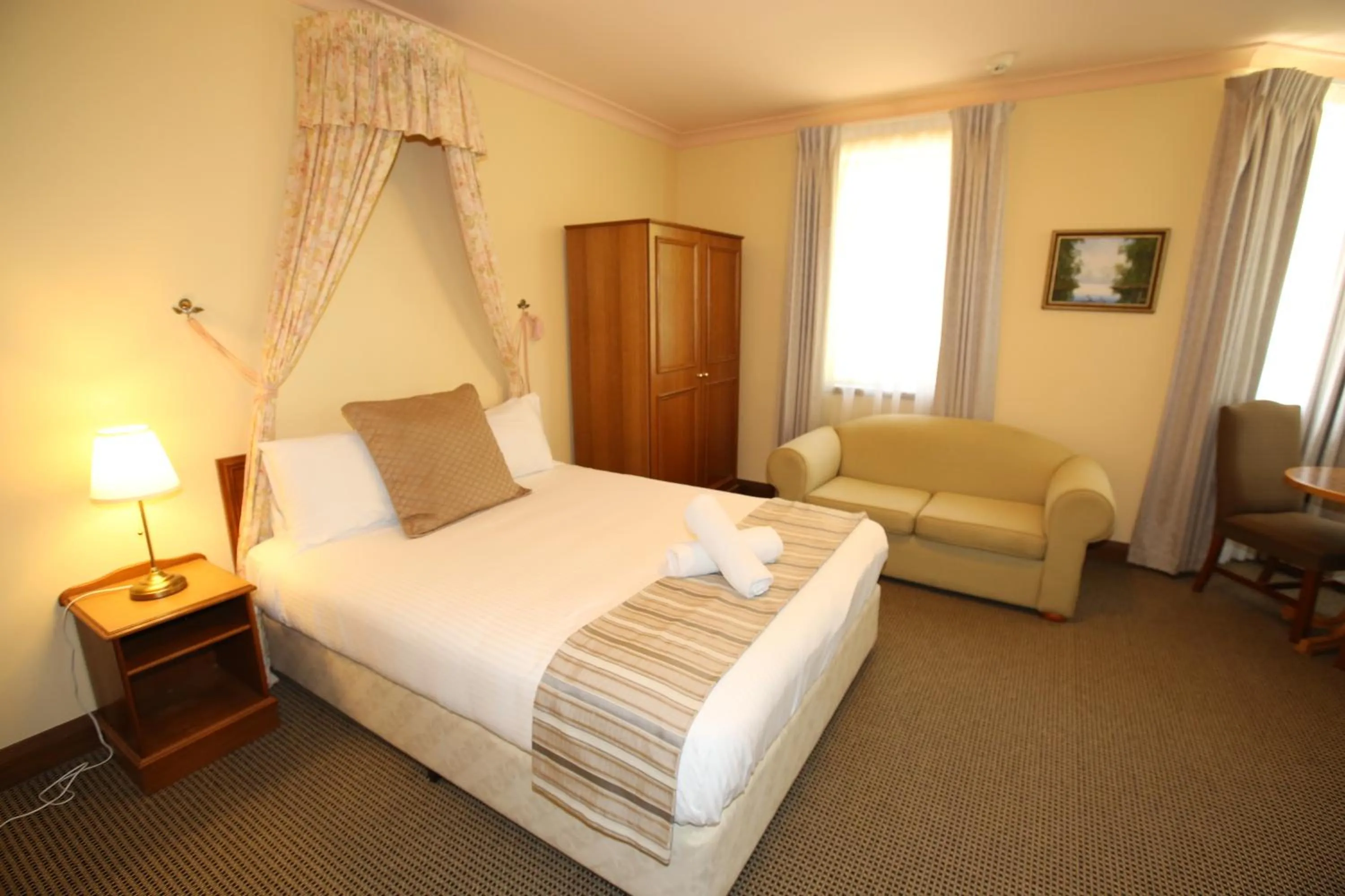 Bed in La Maison Boutique Hotel