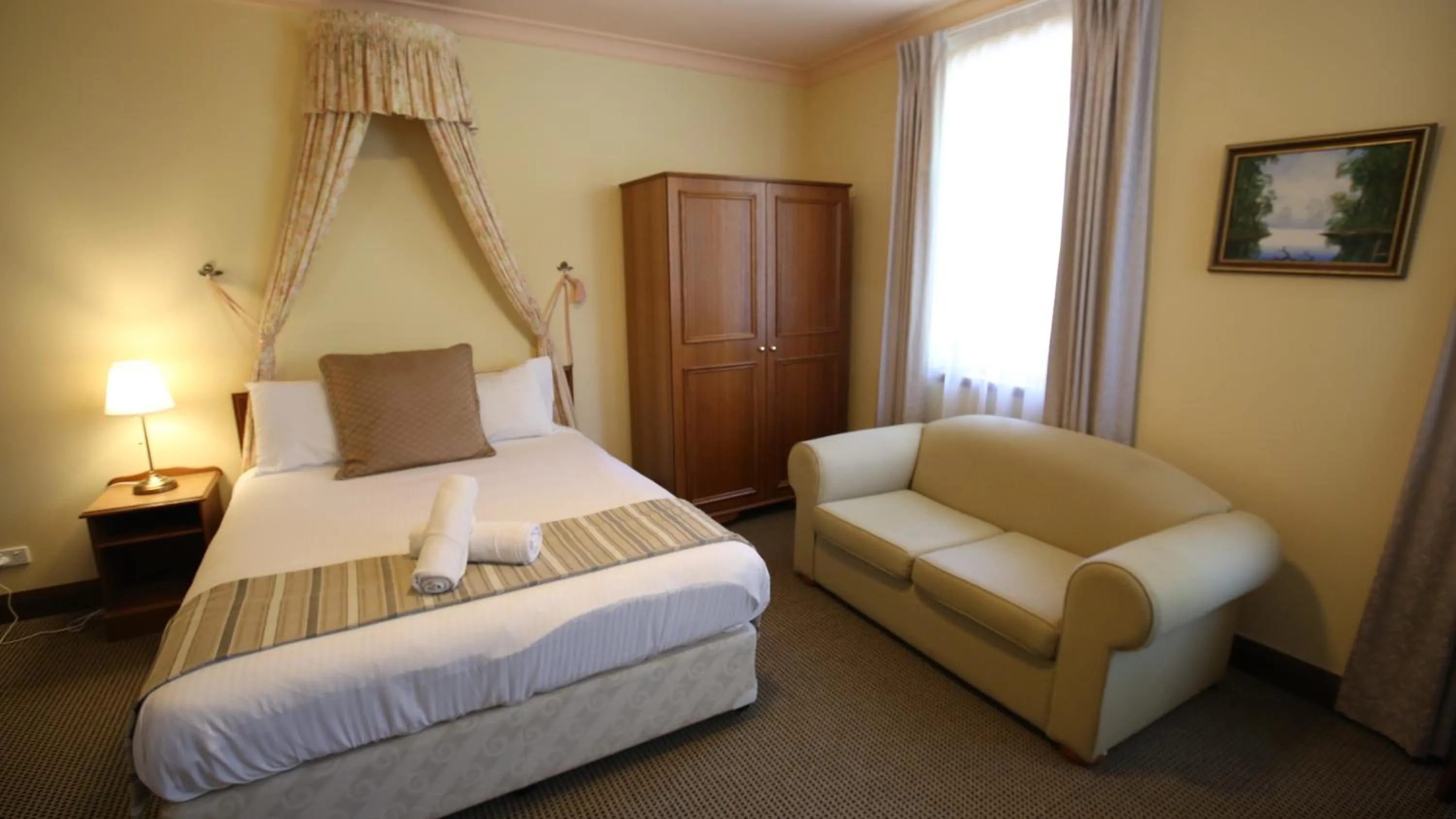 Bed in La Maison Boutique Hotel