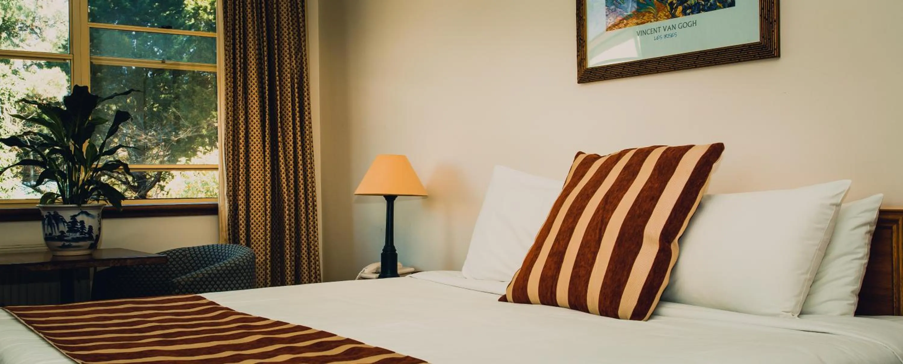 Bed in La Maison Boutique Hotel