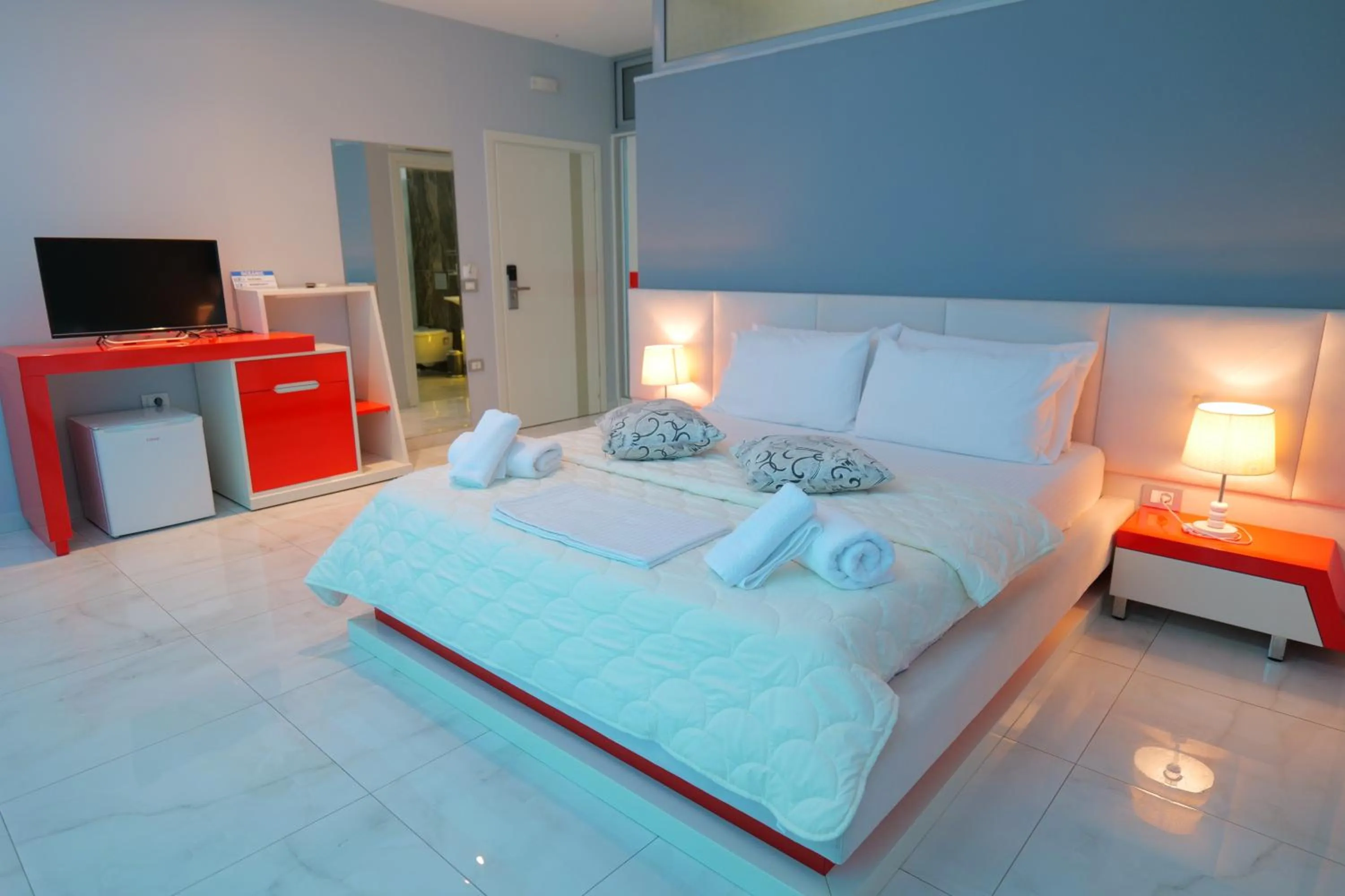 Bed in Oceanic Overview Suites