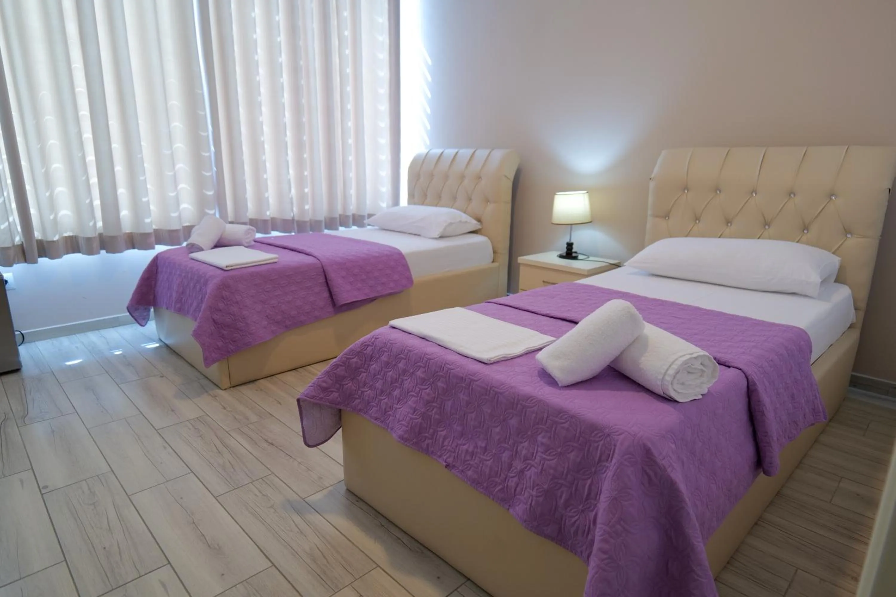 Bed in Oceanic Overview Suites