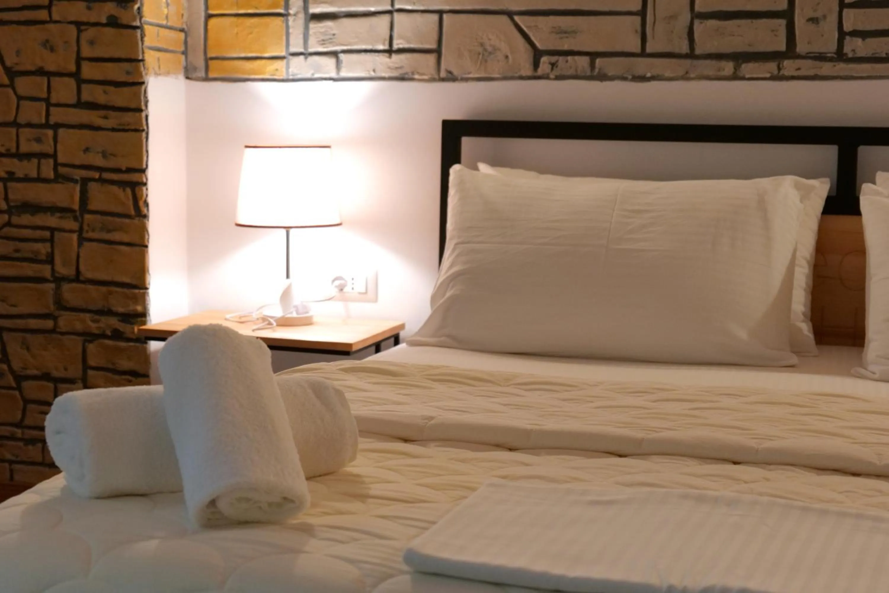 Bed in Oceanic Overview Suites