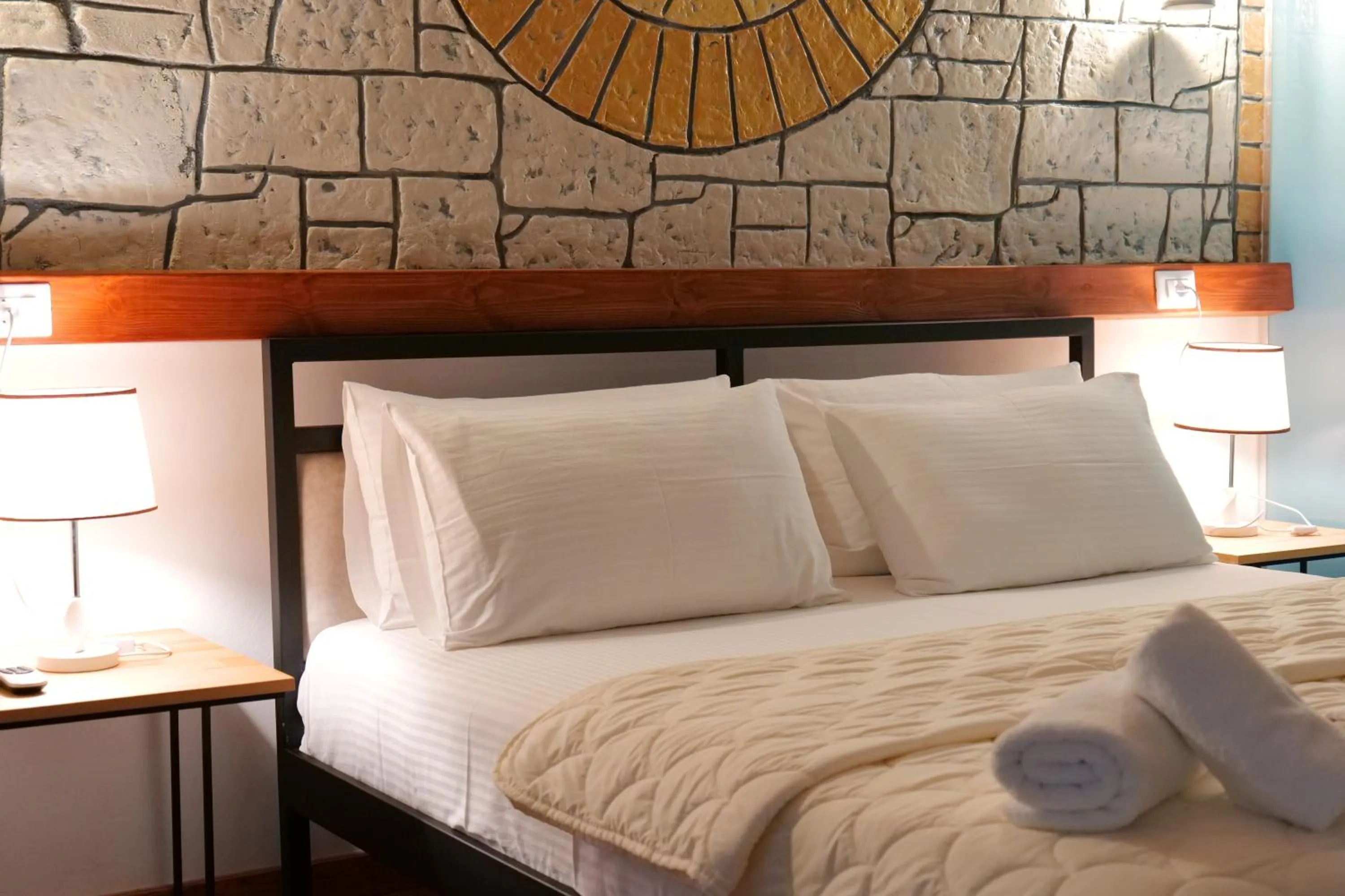 Bed in Oceanic Overview Suites