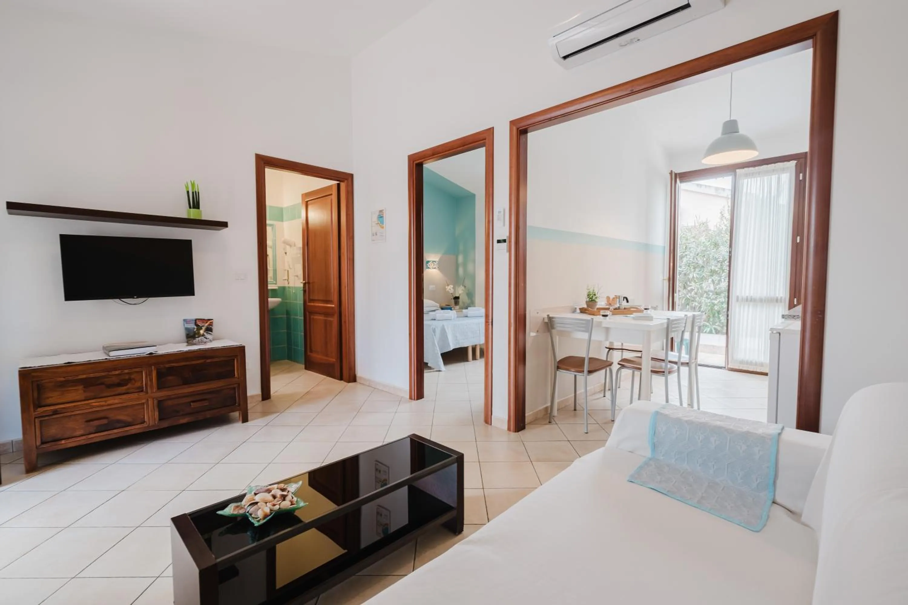 Communal lounge/ TV room in Il Melo Residence