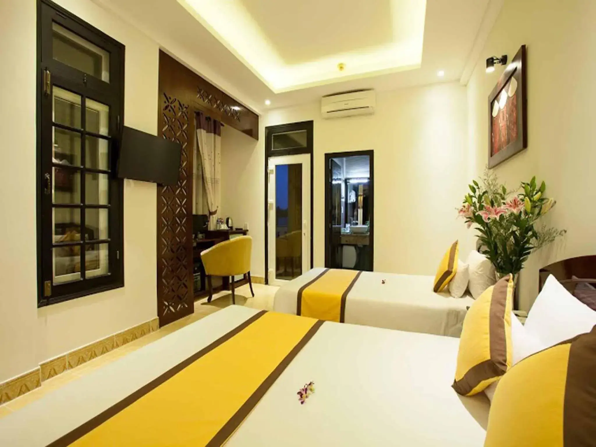 Photo of the whole room, Bed in Hoi An Hai Au Boutique Hotel Photo of the whole room, Bed in Hoi An Hai Au Boutique Hotel