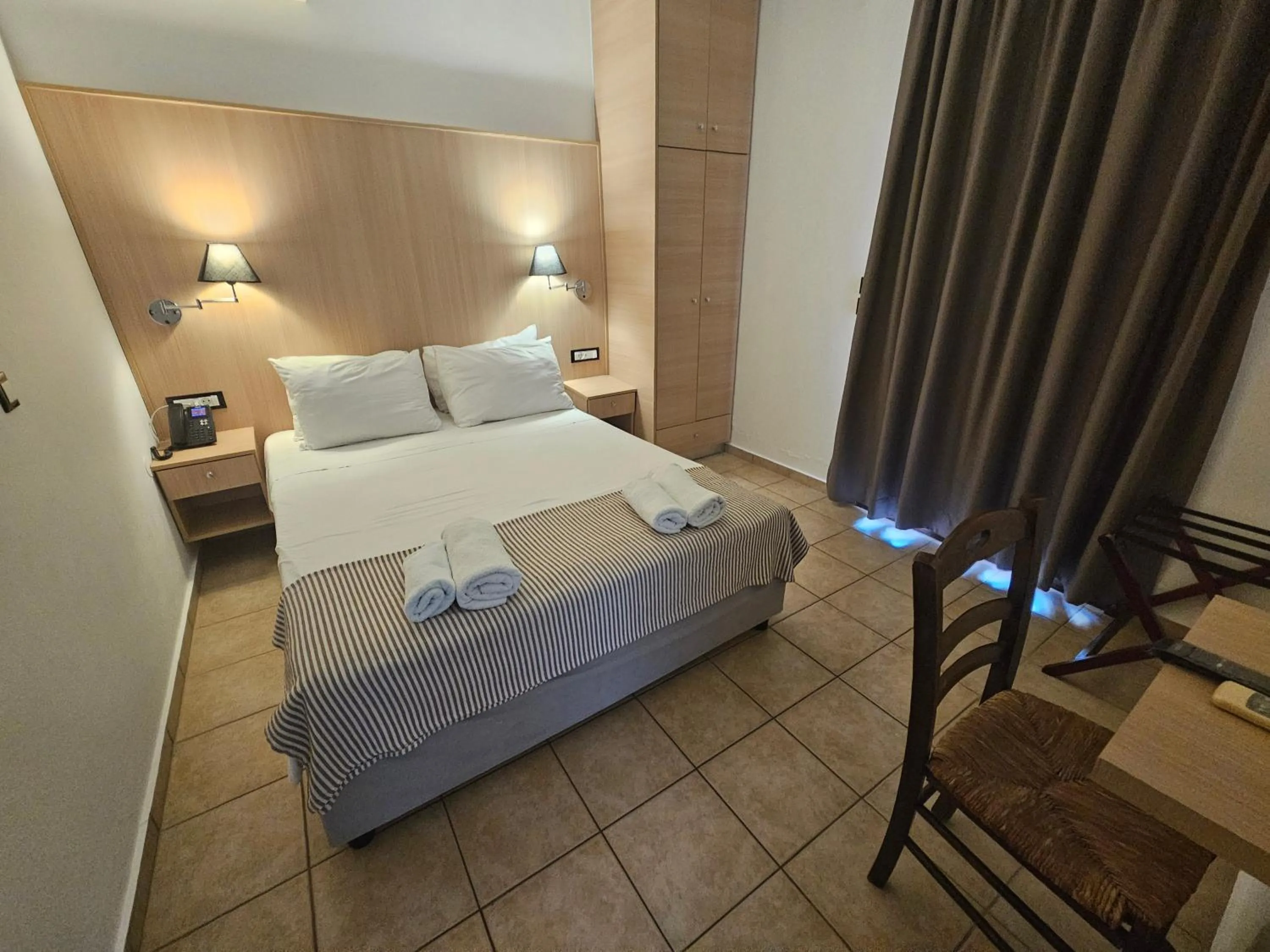 Bed in Elounda Sunrise Apartments