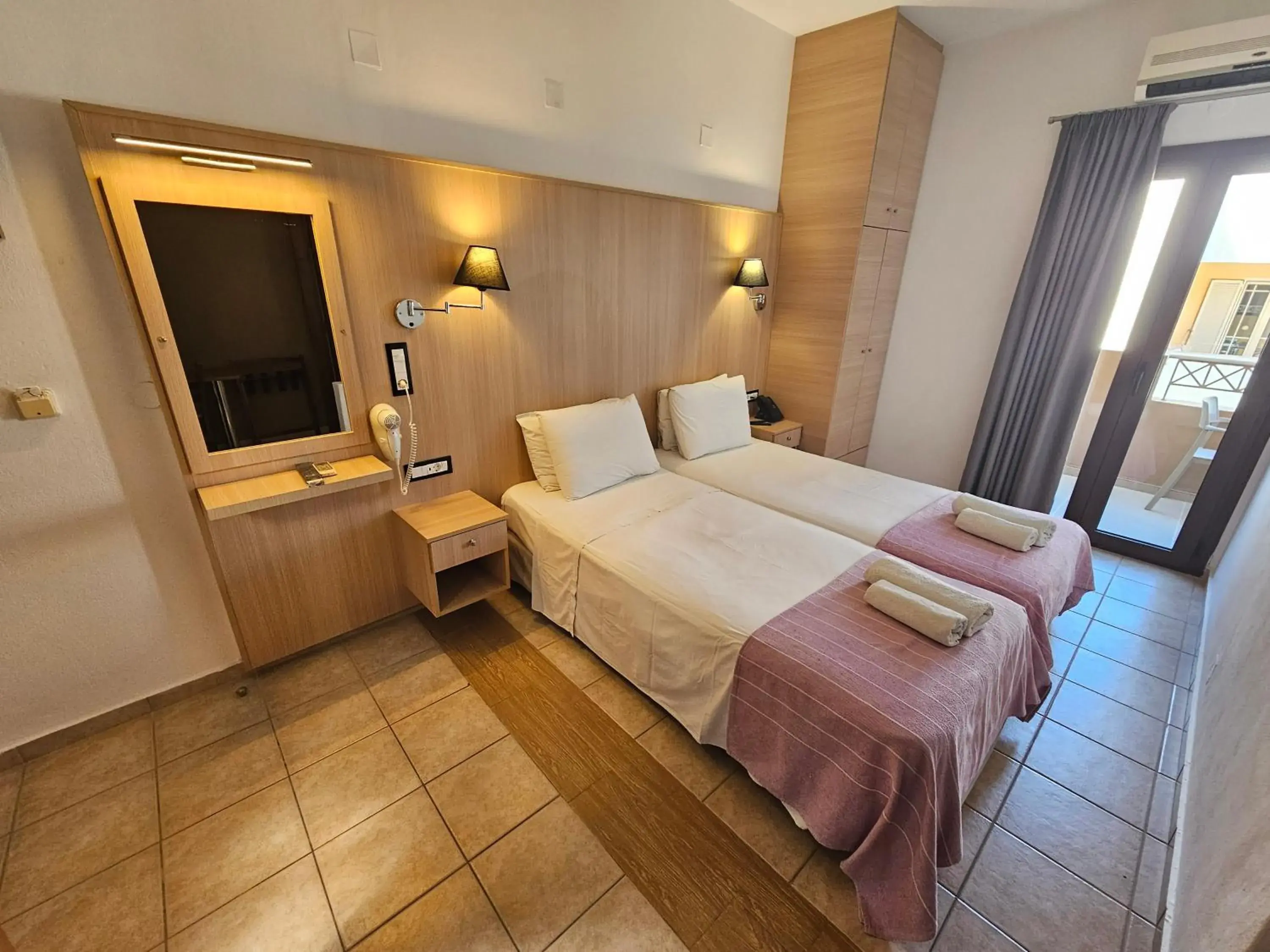 Bed in Elounda Sunrise Apartments Bed in Elounda Sunrise Apartments