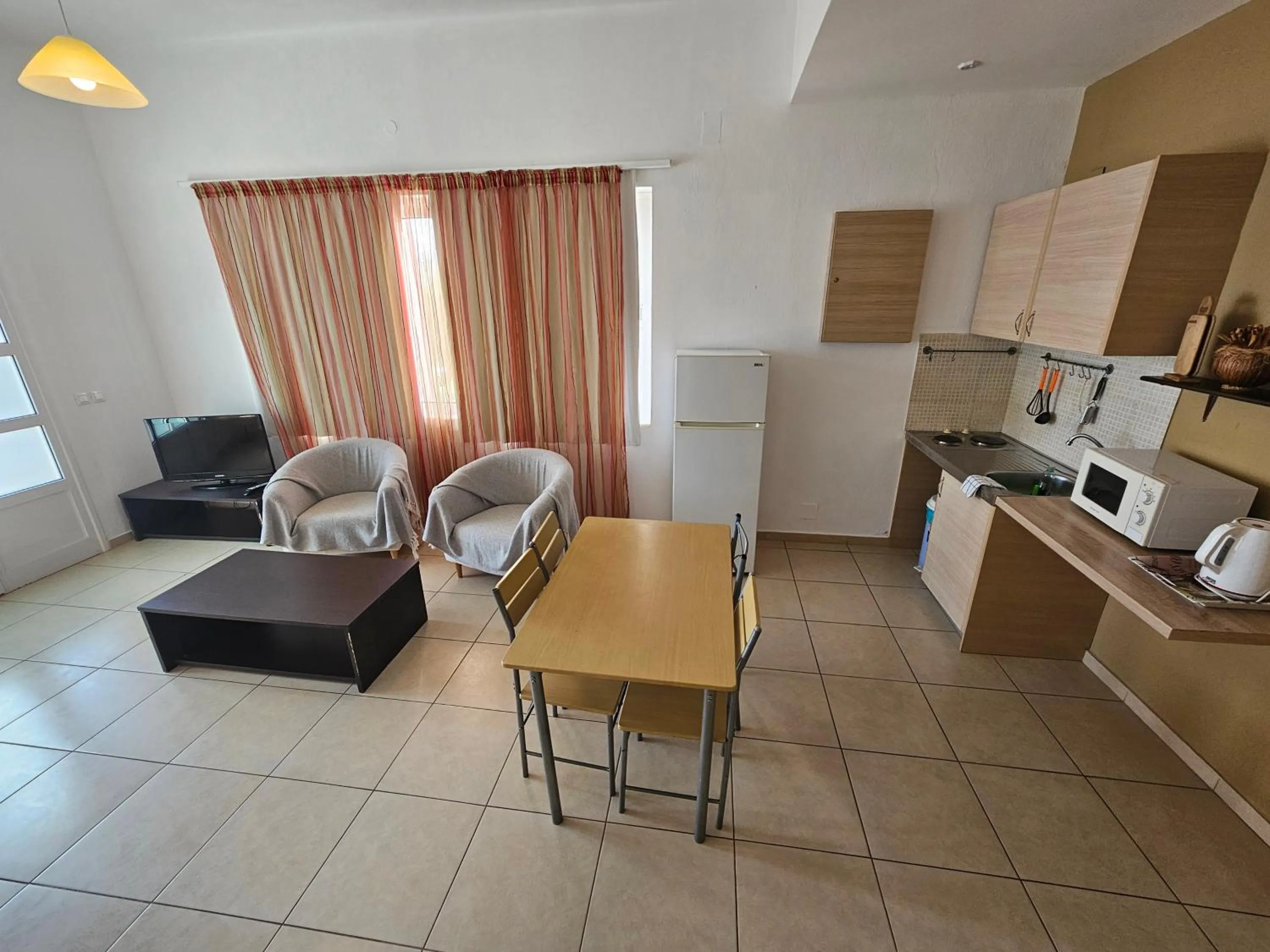 Kitchen or kitchenette in Elounda Sunrise Apartments