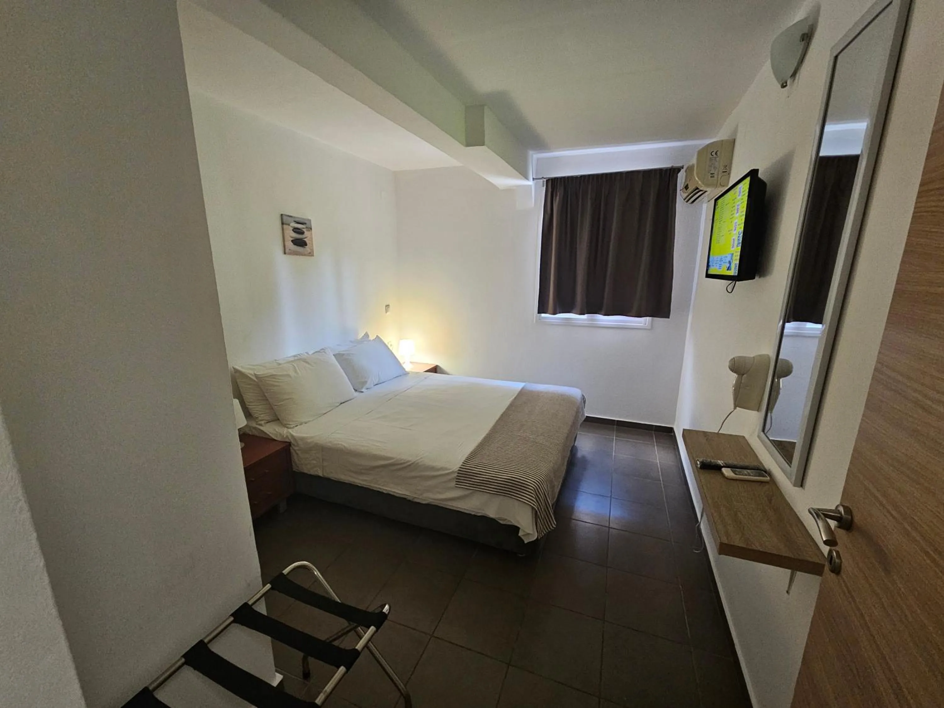 Bed in Elounda Sunrise Apartments