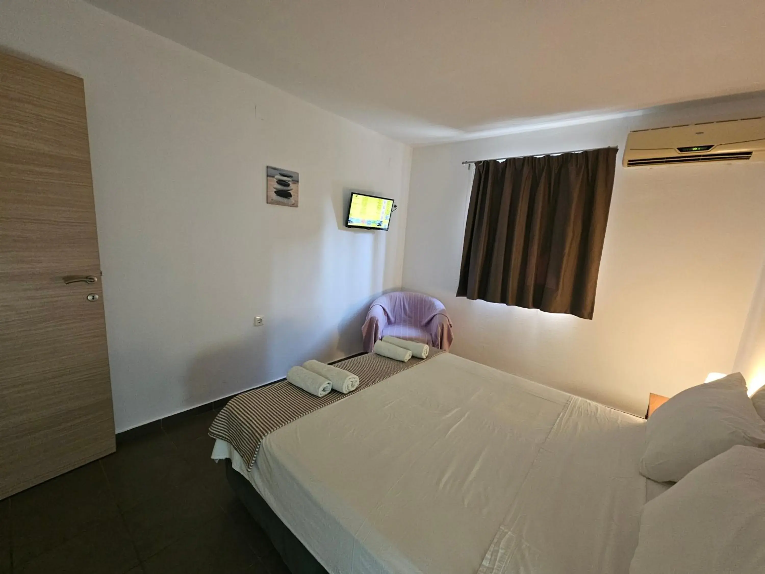 Bed in Elounda Sunrise Apartments Bed in Elounda Sunrise Apartments